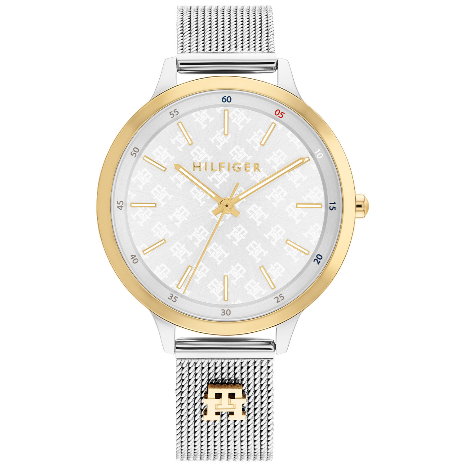 Tommy Hilfiger TH1782586 Horloge Dames Staal Zilverkleurig 36mm
Dit specifieke horloge van Tommy Hilfiger met artikelnr: TH1782586 is een chique sportief dameshorloge die zeker in je collectie past. Het stalen dameshorloge heeft een ronde zilverkleurige kast met een goudkleurige bezel en een zilverkleurige wijzerplaat met daarop de monogrammen van TH. Aan de chique kast zit een zilverkleurige milanese horlogeband met een TH monogram aan de 6-kant. De band is op lengte verstelbaar en heeft een druksluiting. Het horloge heeft een mineraalglas, een doorsnee van 36mm en is 3 ATM.  

Het merk:
Sinds de lancering van het merk in 1985 is Tommy Hilfiger wereldwijd bekend geworden als pionier van de klassieke Amerikaanse coole stijl. Geïnspireerd door de iconische popcultuur en het Amerikaanse erfgoed. De dames en herencollectie van dit seizoen bestaan uit minimalistische silhouetten en rustieke lederen details. De herenhorlogecollectie biedt iconische uurwerken met roestvrijstalen, lederen en siliconen banden.

Specificaties:
- Mineraalglas
- Ronde kast 36mm
- Zilverkleurige horlogekast
- Wijzerplaat met monogrammen
- Zilverkleurige milanese band 
- 3 ATM