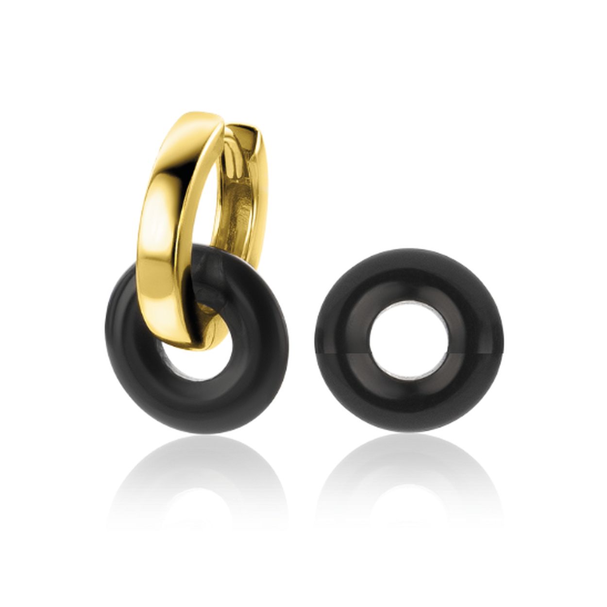 ZINZI ronde oorbedels in 12mm, vervaardigd van echte zwarte onyx edelstenen. Hang ze gemakkelijk aan je ZINZI oorringen. De binnencirkel is 5mm, waardoor deze oorbedels ook aan brede oorringen van 4mm gehangen kunnen worden.