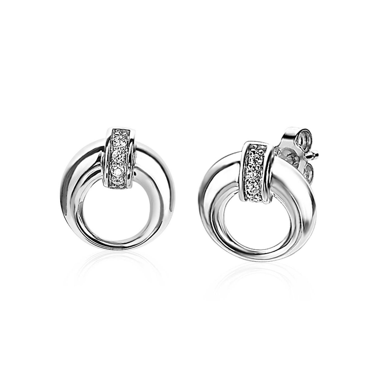 ZINZI zilveren oorsieraden [14mm] met massieve open trendy ronde vorm. Een luxe zetting bezet met witte zirconia's loopt om deze ronde vorm. Het massieve karakter en het open design zorgt voor een opvallende maar elegante uitstraling. Vervaardigd van eerste gehalte zilver (925) en met extra rodiumlaag voor een langdurige glans. 	14 x 3,9 x 13 mm