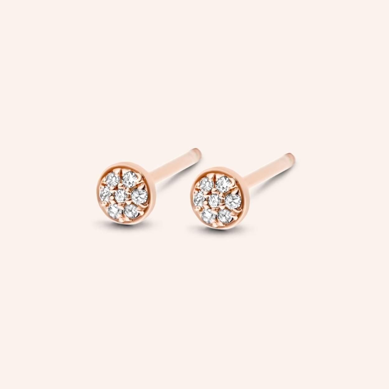 "Less is more" - our First Diamond studs are the sublime exponent of this credo. If you are taking your first steps into diamond jewellery, perhaps these earrings could be the ones to give you the luxurious feeling you're looking for. They each have 7x shimmering diamonds to create the illusion of 1x alluring diamond. Made in sterling silver, gilded with silver rhodium or 18 carat yellow or rose gold vermeil.


Ref: M455 | Earrings | 925 Sterling Silver | 3.70 x 1.80 mm | White Diamond: 14pc