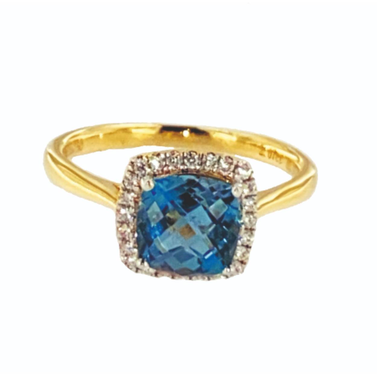 Geel gouden ring met licht blauwe topaas 2.2ct en 0.36ct brilj