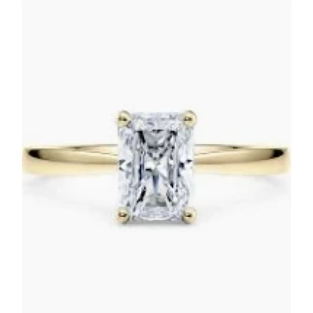 De RX3990-15 is een schitterende ring met een 1,04 karaat radiant geslepen lab-grown diamant, gezet in 18 karaat goud. De diamant heeft een E-kleur en VS2 zuiverheid. Perfect voor verlovingen, straalt deze ring elegantie uit. Draag hem dagelijks of bij speciale gelegenheden voor een verfijnde en stijlvolle uitstraling. Ringmaat 53. Ring wordt geleverd met een IGI diamanten certificaat.