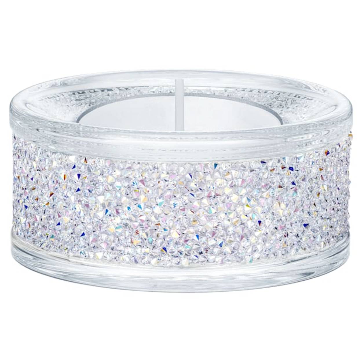 Versiert met meer dan 1500 Swarovski kristallen, geplaatst met behulp van de Crystal Rocks-techniek. Deze eigentijdse glazen theelichthouder schijnt helder met ons kenmerkende Aurora Borealis-effect. Laat gegarandeerd elke ruimte schitteren; het zal een glamoureuze sfeer creëren, zowel overdag als 's avonds. Een perfect cadeau voor een geliefde. Decoratief object. Geen speelgoed. Niet geschikt voor kinderen jonger dan 15 jaar. Kaars niet inbegrepen.

