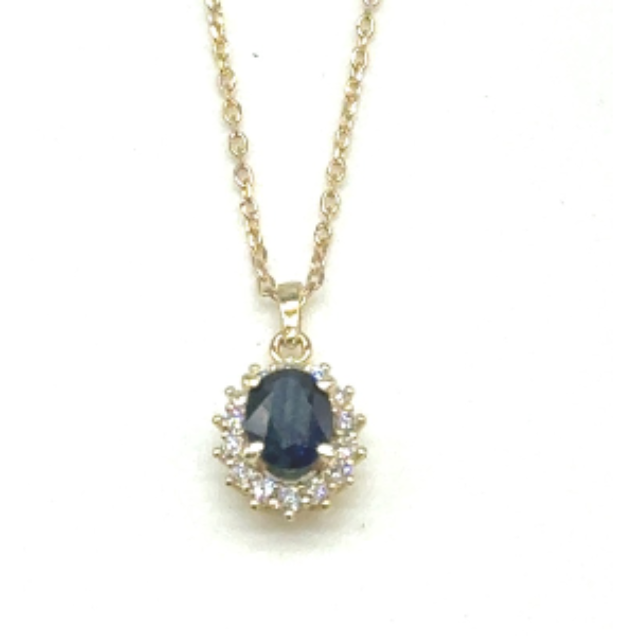 14k geelgouden diamanten collier met een saffier steen. 