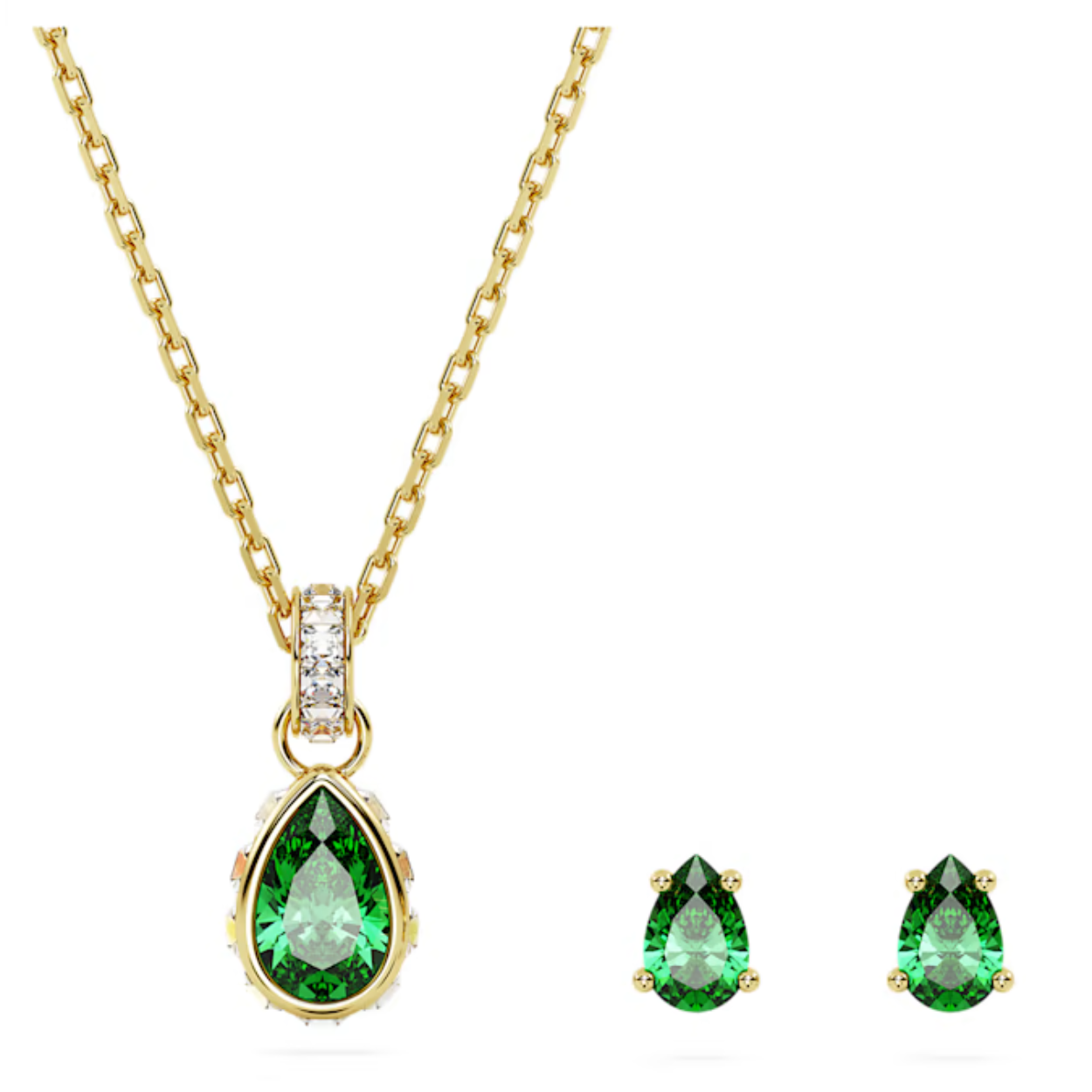 Deze stralende sieradenset uit de Chroma-lijn is perfect voor een op elkaar afgestemde look. De sieraden met een goudkleurige toplaag bestaan uit schitterende groene oorknopjes met een Pear-slijpvorm, en een vrolijke hanger met een steen met een Pear-slijpvorm in het midden en heldere vierkante kristallen langs de randen en het ringetje. Een subtiele en toch krachtige manier om uw stijl een elegant en kleurrijk accent te geven.