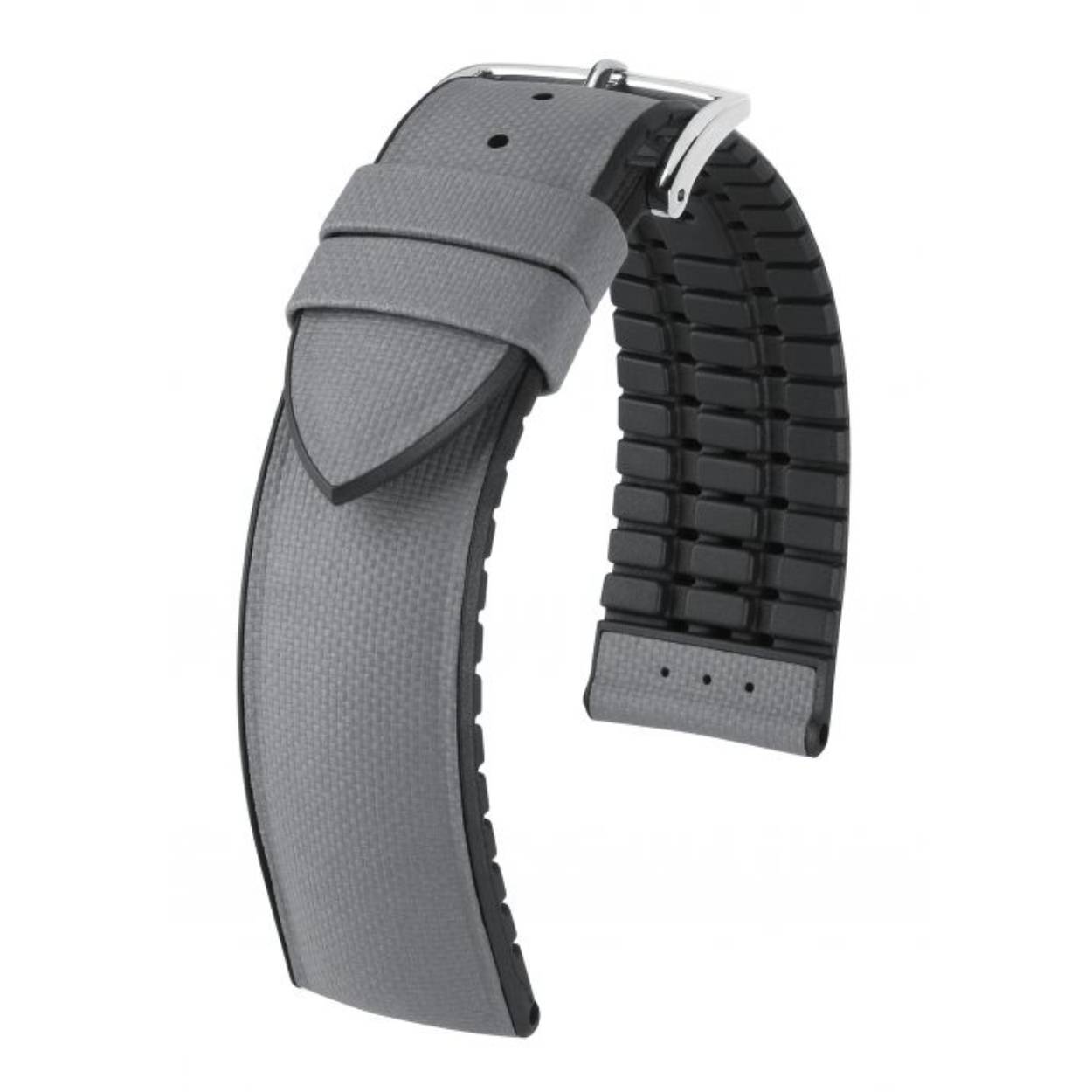 Het puristische ARNE-horlogeband komt uit de HIRSCH Performance Collection en voldoet daarmee ook aan alle criteria van een ideaal sportarmband. Het sportieve, klassieke design overtuigt niet alleen door het hoogwaardige Italiaanse kalfsleer in canvas-look, maar ook door de gekleurde HIRSCH Premium Caoutchouc-kern. Dit maakt ARNE tot een harmonieuze combinatie van sportieve functionaliteit en alledaagse elegantie.