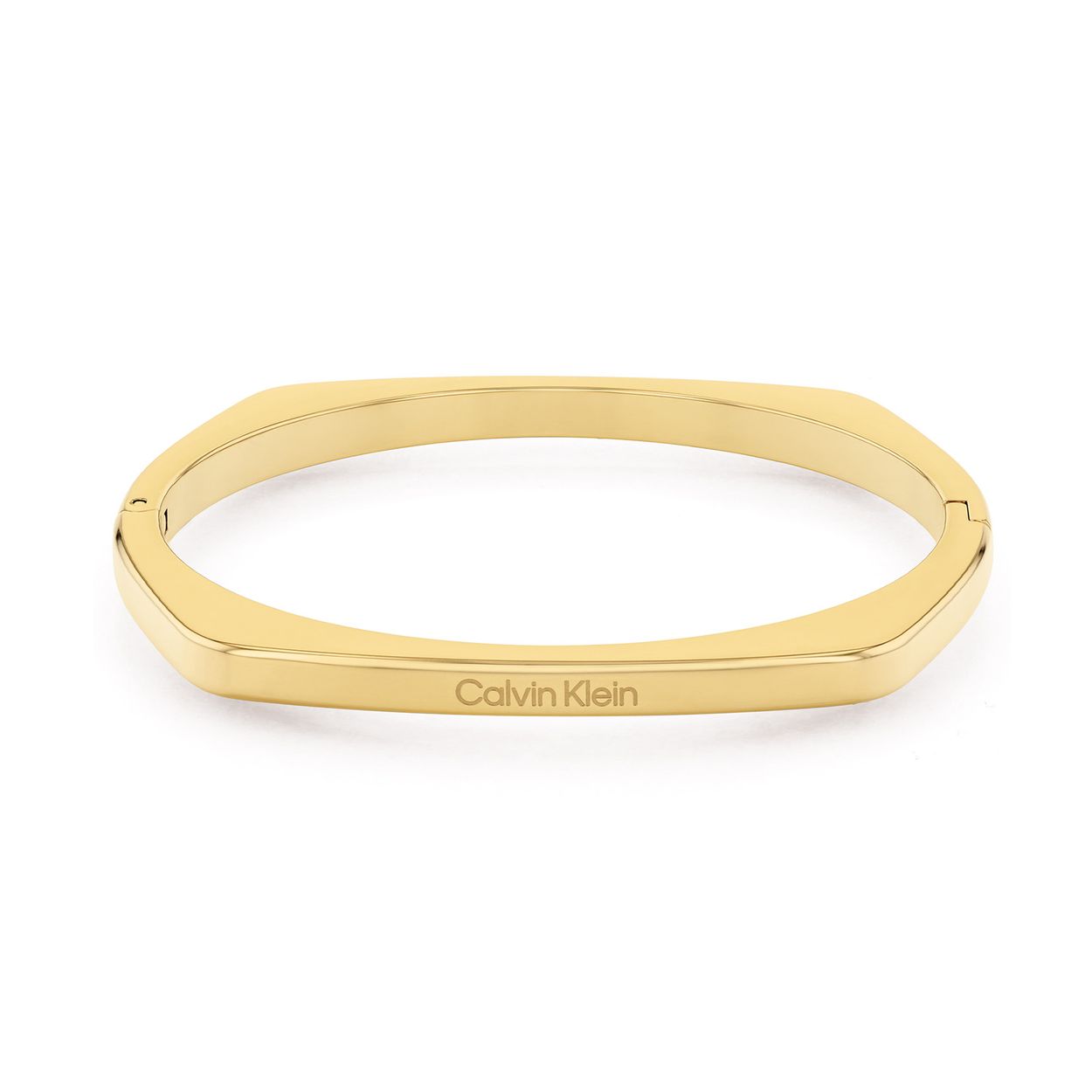 Calvin Klein  Dames Armband Staal 
Deze stalen dames bangle van Calvin Klein uit de Bold Metals serie heeft een opvallend uiterlijk. De goudkleurige bangle heeft een ronde vorm met hoekige kanten en op de bovenzijde is het CK logo gegraveerd. De armband sluit met een scharnier. Leuk te combineren met andere sieraden uit de serie van Calvin Klein.

CJ35000556
