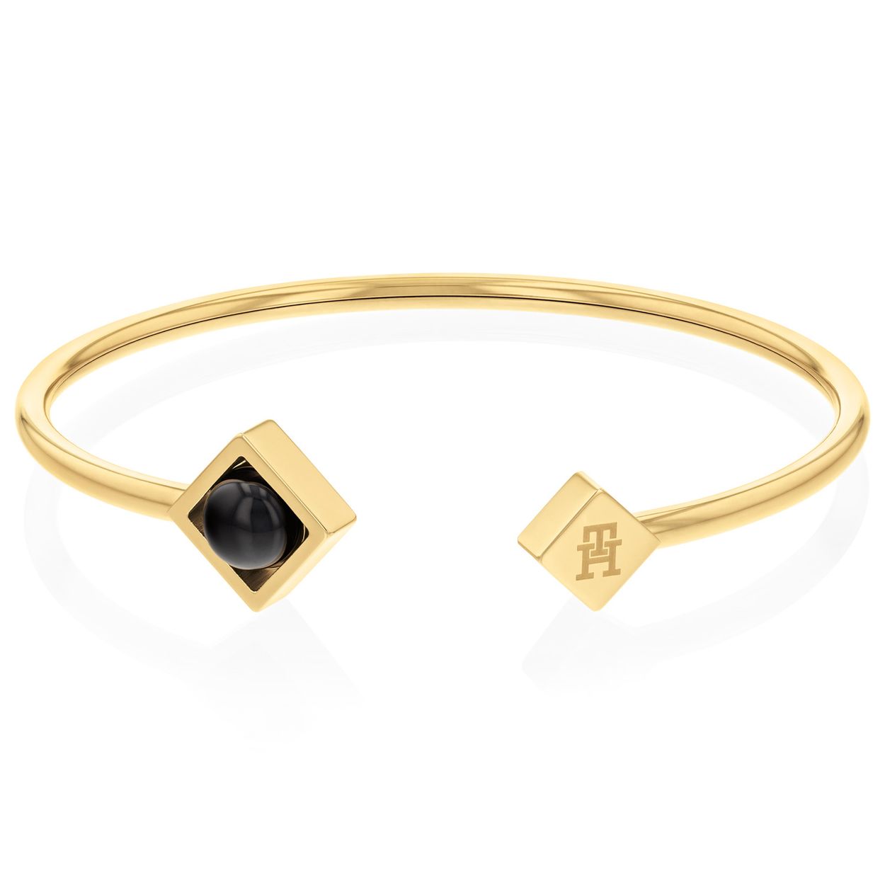 Tommy Hilfiger Jewels TJ2780795 Armband Dames Onyx
Deze armband van Tommy Hilfiger uit de jewelry serie met nr: TJ2780795 is een opvallend model. De goudkleurige stalen open bangle armband heeft bovenop een vierkant kastje met een ronde zwarte onyx steen en een plaatje met het Tommy logo. Zeker leuk te combineren met de bijpassende sieraden uit de set van Tommy Hilfiger.

Het merk:
Tommy Hilfiger is wereldwijd één van de grootste designer lifestyle merken en is internationaal bekend om haar classic American cool stijl. De sieraden zijn voor dames en heren met een eigen stijl, die niet bang zijn om dit aan de wereld te laten zien.

Specificaties:
- Artikelnr: TJ2780795
- Goudkleurige bangle armband met onyx
- Materiaal: Staal
- Lengte: 51mm x 60mm
- Dames sieraad