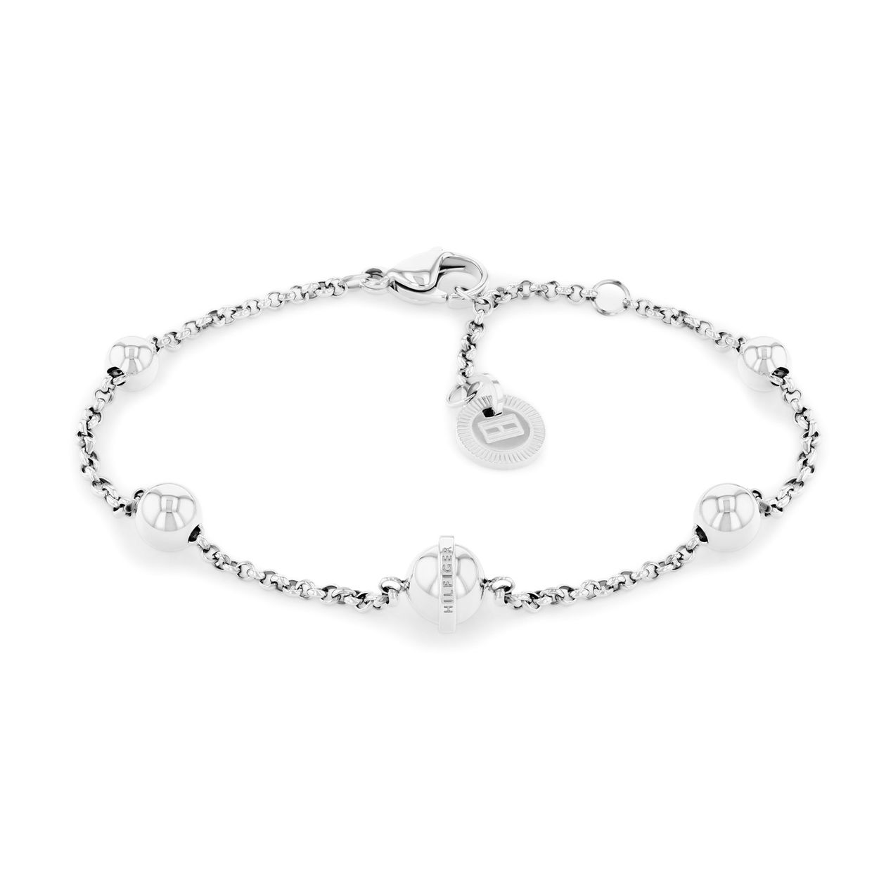Tommy Hilfiger Jewels TJ2780816 Armband Dames 20cm
Deze armband van Tommy Hilfiger uit de jewelry serie met nr: TJ2780816 is een speels model. De zilverkleurige stalen schakelarmband heeft meerdere bolletjes van verschillende grootte over de armband verdeeld. De dames armband heeft een karabijnsluiting en is op verschillende lengtes te dragen door de extra tussenogen. De totale lengte is 20cm. Leuk te combineren met de bijpassende oorknoppen en ketting van Tommy Hilfiger.

Het merk:
Tommy Hilfiger is wereldwijd Ã©Ã©n van de grootste designer lifestyle merken en is internationaal bekend om haar classic American cool stijl. De sieraden zijn voor dames en heren met een eigen stijl, die niet bang zijn om dit aan de wereld te laten zien.

Specificaties:
- Artikelnr: TJ2780816
- Armband
- Materiaal: Staal
- Lengte: 20cm
- Dames sieraad