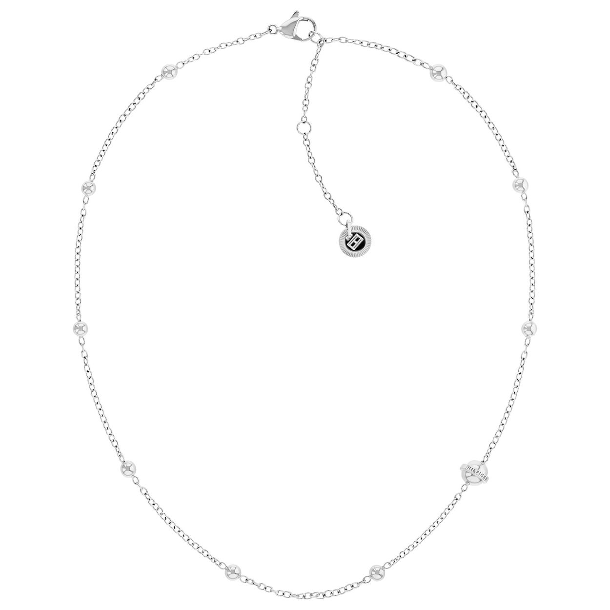Dit Tommy Hilfiger collier is gemaakt van edelstaal en heeft een zilverkleurige afwerking met bolletjes. Het collier heeft een trendy en opvallend design dat perfect past bij elke outfit. Draag dit collier solo voor een elegante look of combineer het met andere kettingen voor een trendy gelaagde stijl. Een must-have accessoire voor elke fashionista!