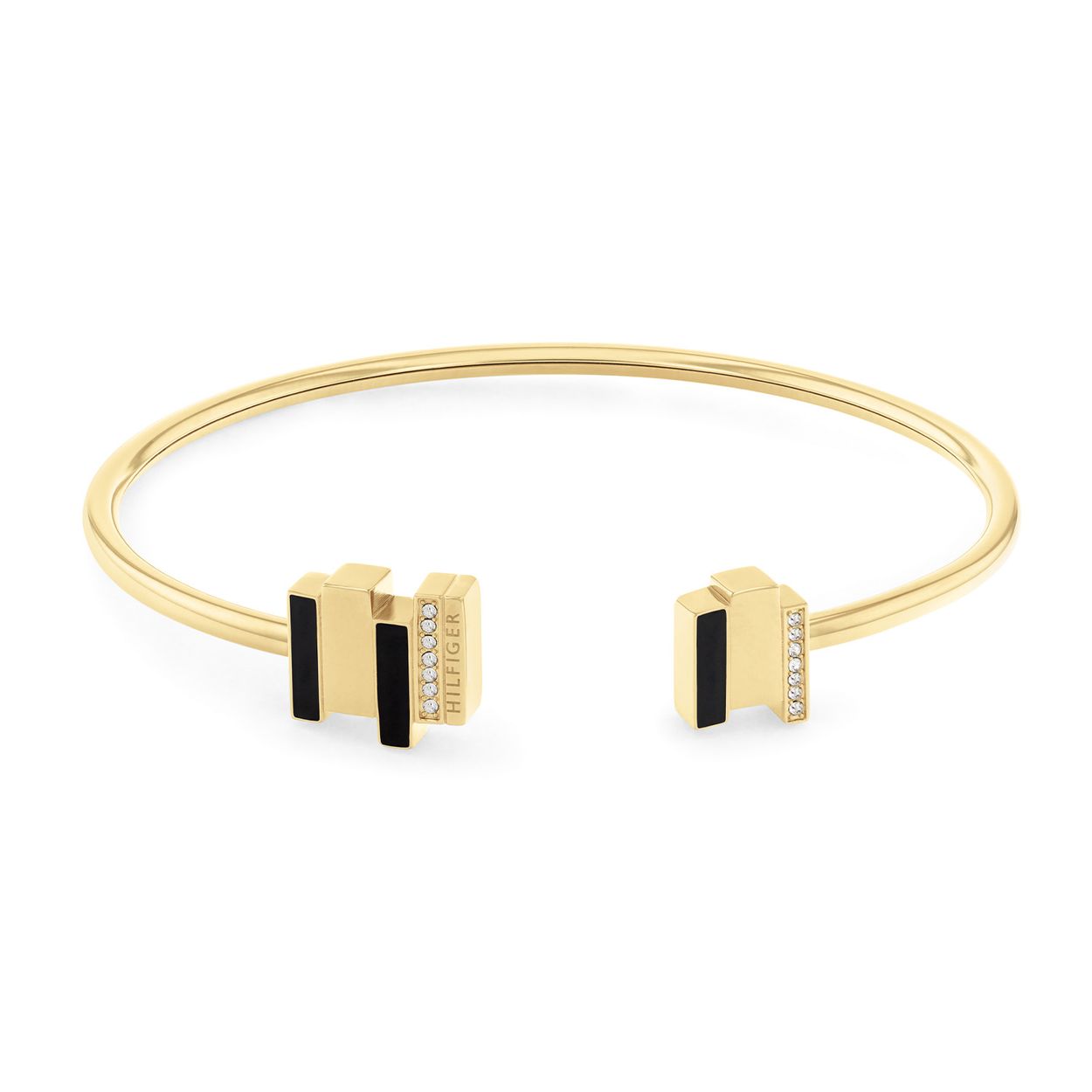 Tommy Hilfiger Jewels TJ2780846 Bangle Dames Staal
Deze bangle van Tommy Hilfiger uit de jewelry serie met nr: TJ2780846 is kleurvol. De stalen strakke buisarmband is opengewerkt en heeft bovenop zwarte emaille en goudkleurige staafjes waarvan 1 met kristal en 1 met het Tommy logo. De damesarmband is 6x5cm. Leuk te combineren met de bijpassende oorknoppen en andere sieraden van Tommy Hilfiger. 

Het merk:
Tommy Hilfiger is wereldwijd Ã©Ã©n van de grootste designer lifestyle merken en is internationaal bekend om haar classic American cool stijl. De sieraden zijn voor dames en heren met een eigen stijl, die niet bang zijn om dit aan de wereld te laten zien.

Specificaties:
- Artikelnr: TJ2780846
- Bangle met zwart emaille
- Materiaal: Goudkleurig staal
- Afmeting: 6x5cm
- Dames sieraad met kristal