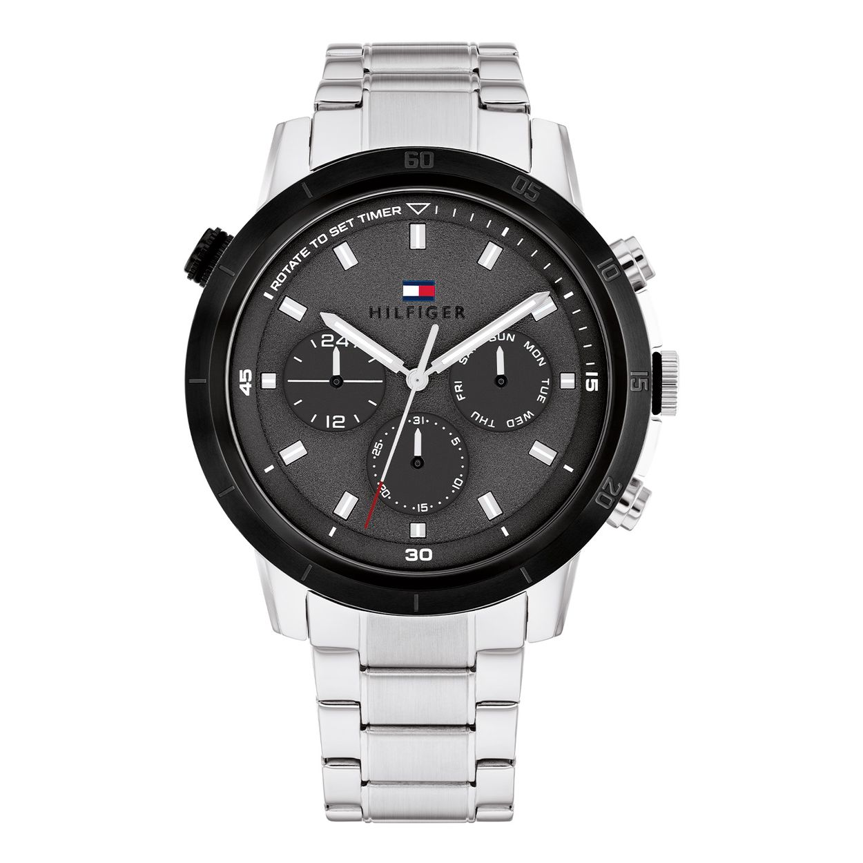 Tommy Hilfiger TH1792106 Horloge Heren Staal 46mm
Dit specifieke horloge van Tommy Hilfiger uit de Troy serie met artikelnr: TH1792106 is een opvallend horloge die zeker in je collectie past. Het herenhorloge heeft een zilverkleurige gerecyclede kast met een zwarte bewerkte draaibare bezel. Op de donker grijze wijzerplaat zijn de datum,- dag en 24-uursaanduiding extra benadrukt. Het horloge heeft een extra knop voor de timer functie die met de draaibare bezel in werking staat. De wijzers hebben een lumibrite vulling en vallen daardoor goed op. Aan het stoere horloge zit een zilverkleurige mat glimmende schakelband. Verder heeft het een mineraalglas, een doorsnee van 46mm en is 5ATM.  

Het merk:
Sinds de lancering van het merk in 1985 is Tommy Hilfiger wereldwijd bekend geworden als pionier van de klassieke Amerikaanse coole stijl. Geïnspireerd door de iconische popcultuur en het Amerikaanse erfgoed. De dames en herencollectie van dit seizoen bestaan uit minimalistische silhouetten en rustieke lederen details. De herenhorlogecollectie biedt iconische uurwerken met roestvrijstalen, lederen en siliconen banden.

Specificaties:
- Mineraalglas
- Ronde kast 46mm
- Zilverkleurige gerecyclede kast
- Grijze wijzerplaat
- Zilverkleurige schakelband
- Timer 
- 5ATM