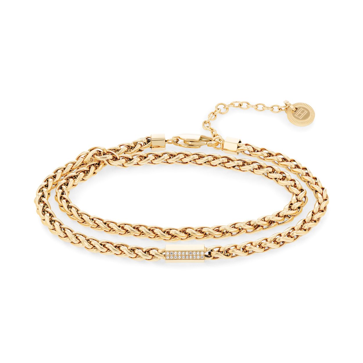 Tommy Hilfiger Jewels TJ2780876 Armband Dames Staal 
Deze armband van Tommy Hilfiger uit de jewelry serie met nr: TJ2780876 heeft een stoere uitstraling. De goudkleurige stalen vossenstaart schakelarmband is extra lang zodat je hem dubbel om de pols kan dragen. De dames armband heeft in het midden een tonnetje met kristallen erin. Door de extra tussenogen aan het verlengkettinkje kan hij op verschillende lengtes gedragen worden. De armband sluit met een karabijnslot en heeft een totale lengte van 38cm. Ook leuk te combineren met andere sieraden van Tommy Hilfiger.

Het merk:
Tommy Hilfiger is wereldwijd &Atilde;&copy;&Atilde;&copy;n van de grootste designer lifestyle merken en is internationaal bekend om haar classic American cool stijl. De sieraden zijn voor dames en heren met een eigen stijl, die niet bang zijn om dit aan de wereld te laten zien.

Specificaties:
- Wikkelarmband met kristallen
- Goudkleurig Staal
- Totale lengte 38cm
- Dames sieraad