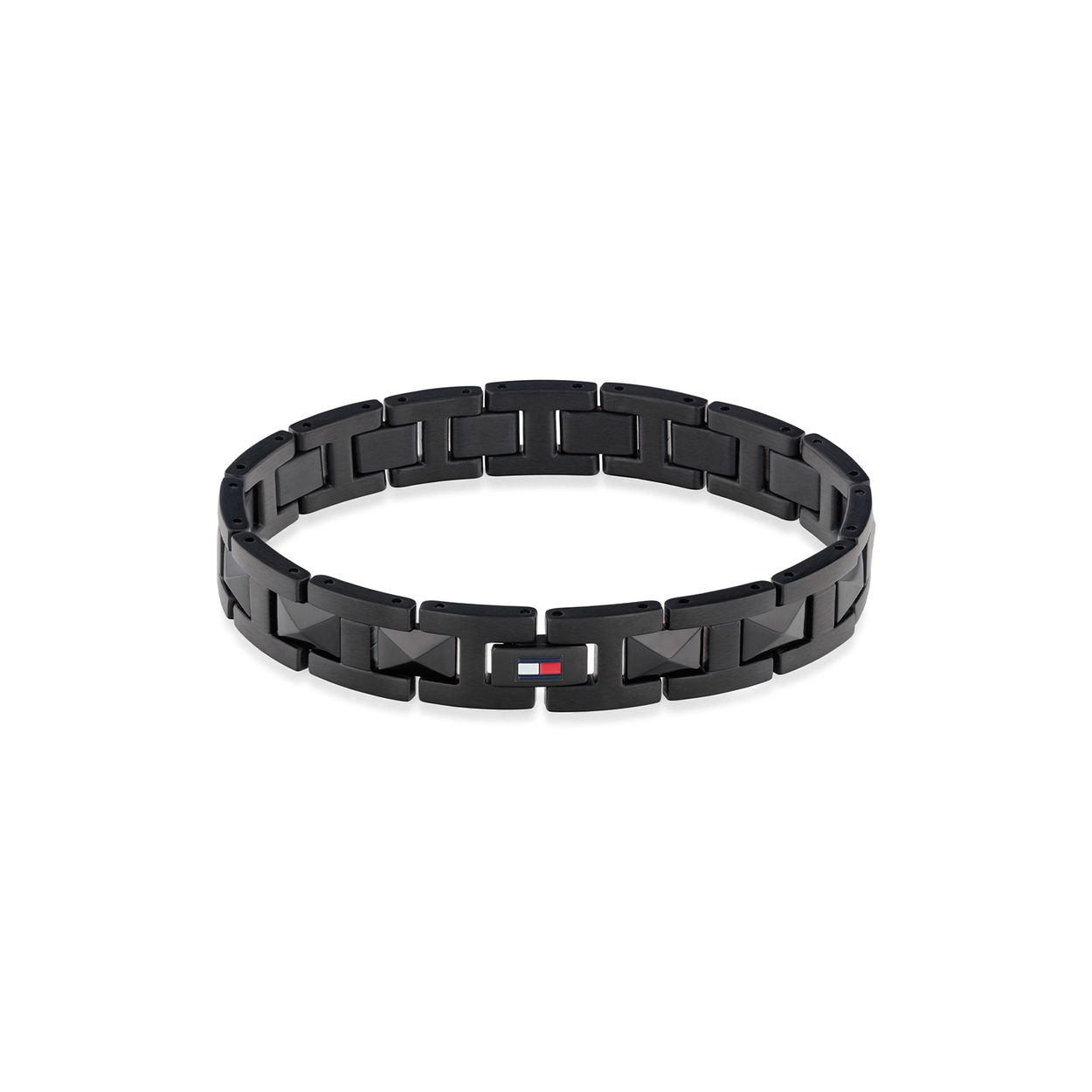 Tommy Hilfiger Jewels TJ2780568 Armband Heren Staal Zwart
Deze armband van Tommy Hilfiger uit de jewelry serie met nr: TJ2780568 heeft een stoere uitstraling. De strakke stalen zwarte heren armband heeft vierkante schakels met hoekige kernen. De klapsluiting is in dezelfde vorm waardoor hij mooi in de armband overloopt en niet opvalt. Op de armband is het Tommy logo in kleur goed zichtbaar. De lengte van deze armband is 19cm. Ook leuk te combineren met andere sieraden van Tommy Hilfiger.

Het merk:
Tommy Hilfiger is wereldwijd één van de grootste designer lifestyle merken en is internationaal bekend om haar classic American cool stijl. De sieraden zijn voor dames en heren met een eigen stijl, die niet bang zijn om dit aan de wereld te laten zien.

Specificaties:
- Stalen armband
- Zwarte vierkante schakels
- Totale lengte 19cm
- Heren sieraad