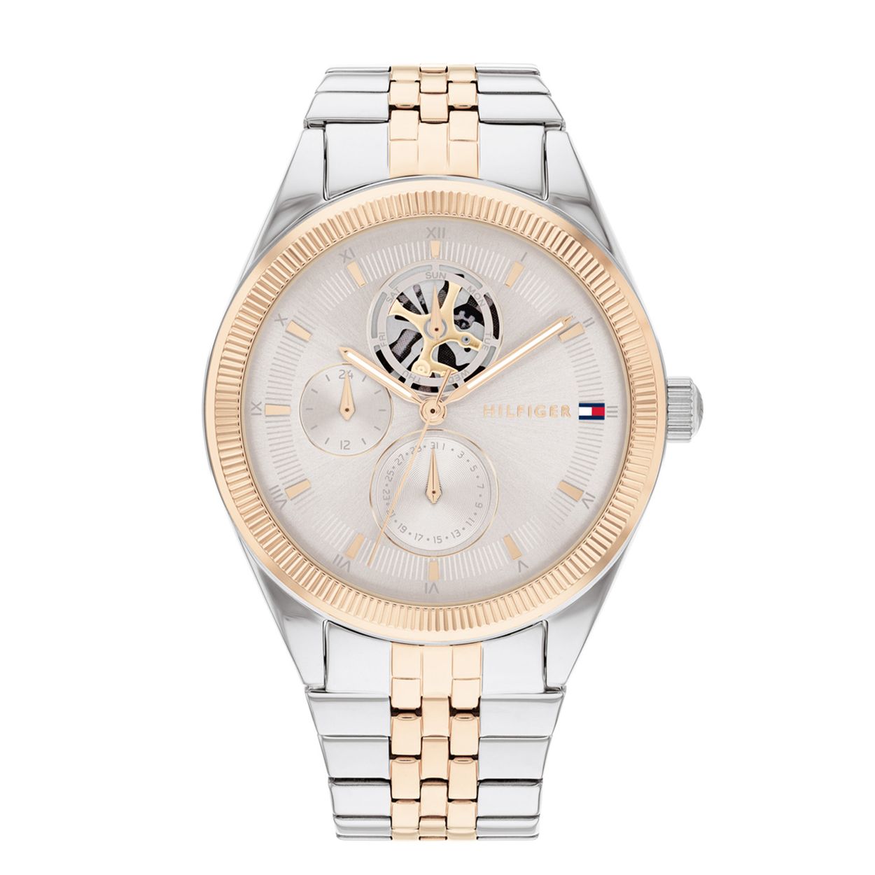 Dit Tommy Hilfiger horloge behoort tot de Monica collectie.
Referentienumer: TH178716 

Dit horloge van Tommy Hilfiger is een sportief dameshorloge die niet in je collectie mag ontbreken. Het stalen dameshorloge heeft een ronde zilverkleurige kast met een rosékleurige gekartelde bezel en een grijze sunray wijzerplaat met een dag,- datum en 24-uursaanduiding. De dagaanduiding wordt getoond in een opengewerkt oog waardoor het uurwerk zichtbaar is. Aan de kast zit een fijne bicolor schakelband met een vouwsluiting. Het horloge heeft een mineraalglas, een doorsnee van 38mm en is 3ATM.  
