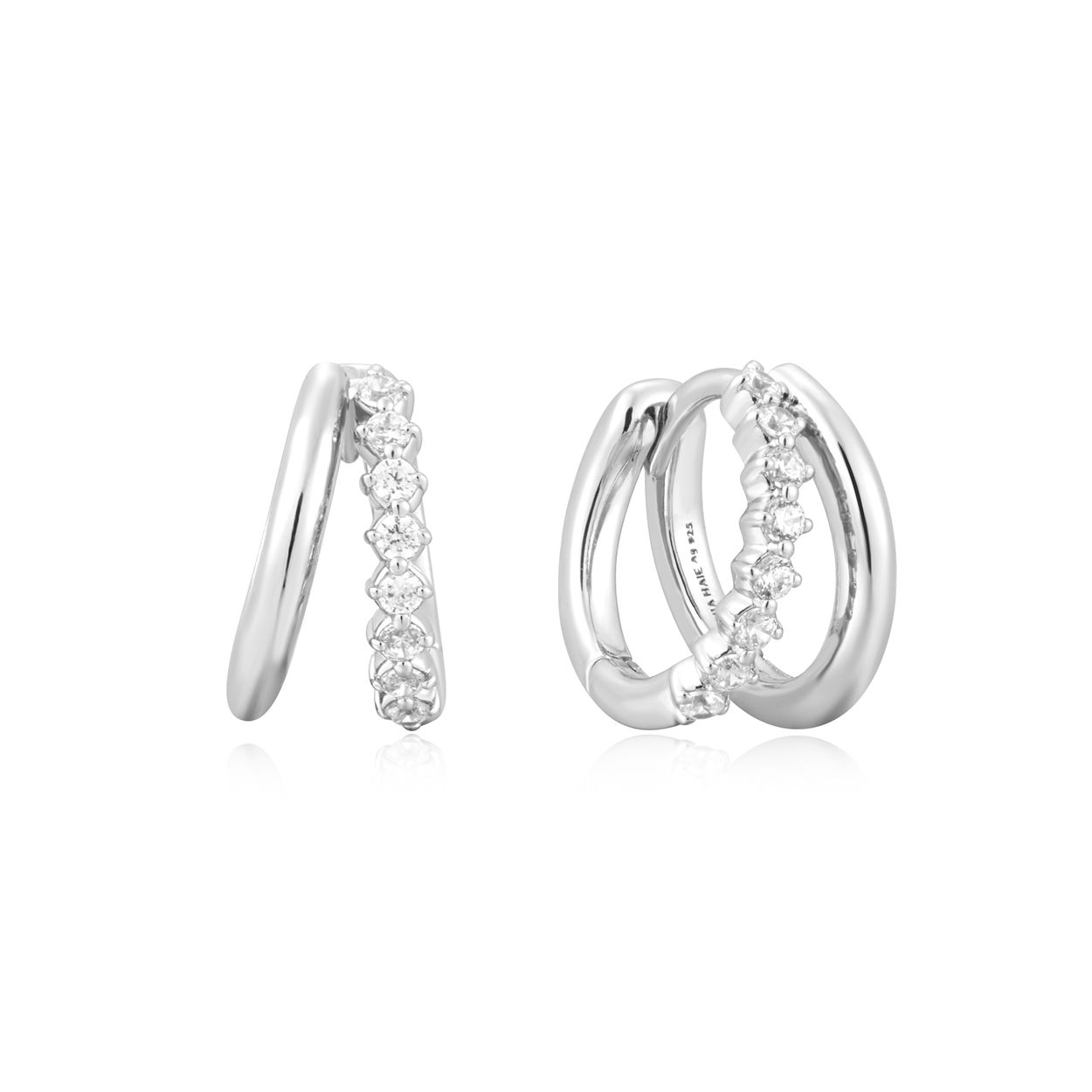 Omarm hedendaagse elegantie met onze dubbele lusoorringen met een rij zirkonia steentjes ingelegd op elke ring.

HET MERK
Geïnspireerd door de laatste fashion trends is Ania Haie het toonaangevende sieradenmerk voor hoogkwalitatieve maar ook betaalbare zilveren sieraden, zonder op de kwaliteit in te leveren. Iedere collectie is gebaseerd op de laatste catwalktrends, waardoor Ania Haie snel tot hét sieradenmerk voor stijlbewuste consumenten is verkozen. Elk sieraad wordt ontworpen om te combineren met andere sieraden waardoor je je eigen look kunt creëren. Maar ook zijn Ania Haie sieraden opvallend genoeg om op zichzelf te dragen.

SPECIFICATIES
- Ania Haie
- Oorbellen
- Lengte 8,5mm
- 925 zilver met gold/ rhodium plating
- AH E059-15H