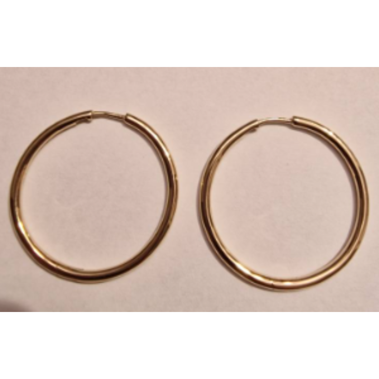 14k massieve geelgouden creolen, draaddikte 2mm en 30 mm diameter 
