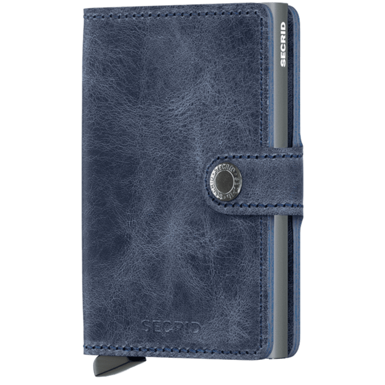 Vintage
Ons vintage leer heeft een licht geschuurd oppervlak en een hoog wasgehalte dat het voorziet van een stonewashed look. Dit levendige leer wordt persoonlijker met gebruik.

Miniwallet Vintage Blue is gecorrigeerd leer, gemaakt in Nederland van Europese runderhuiden. Bezoek onze leerpagina voor meer informatie over leereigenschappen, ons productieproces en verzorgingsinstructies.

Draagt
4 verdikte of 6 platte kaarten
4 extra kaarten
Bankbiljetten
Visitekaartjes
Bonnetjes
Afmetingen en gewicht
65 x 102 x 21 mm