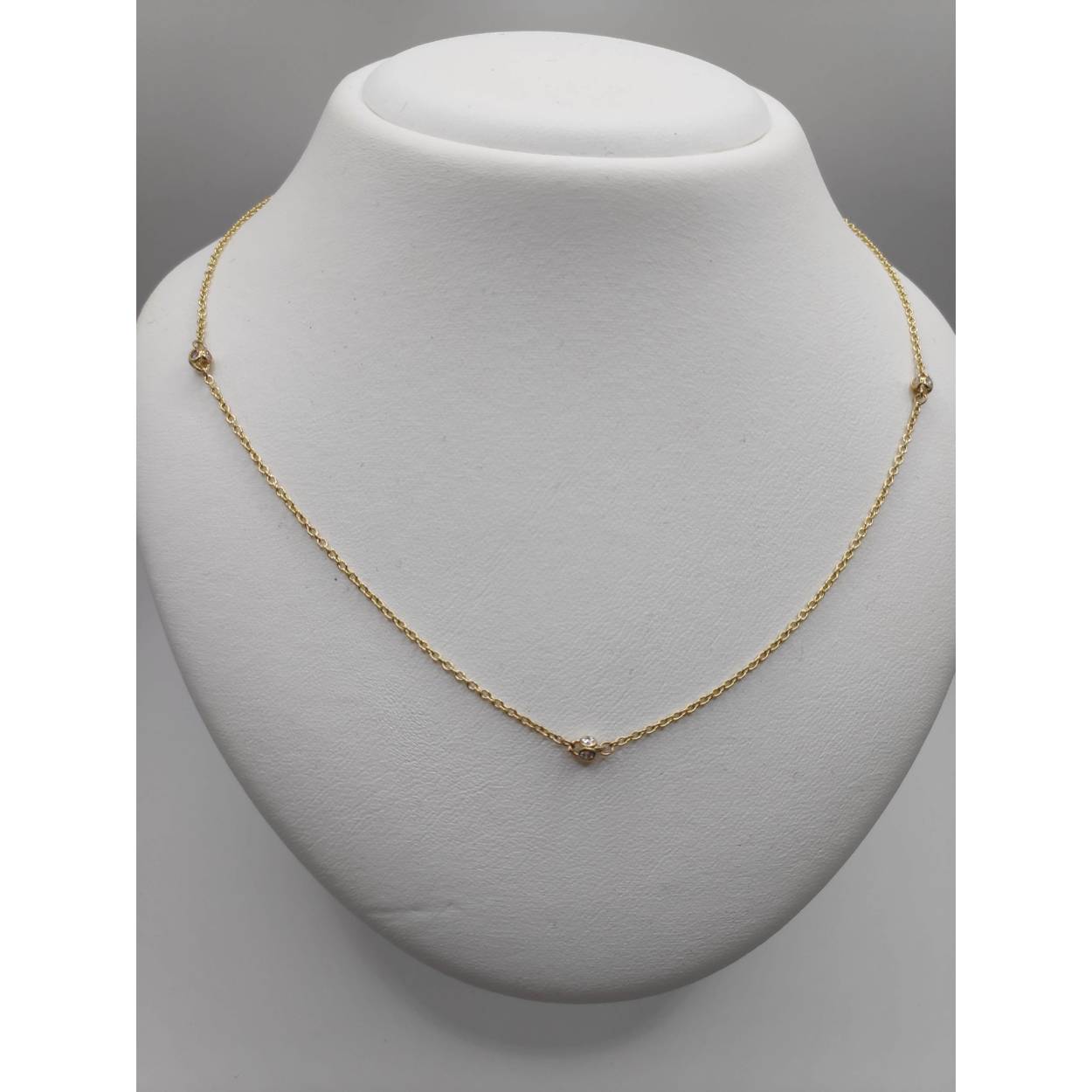 Gouden collier met zirkonia's