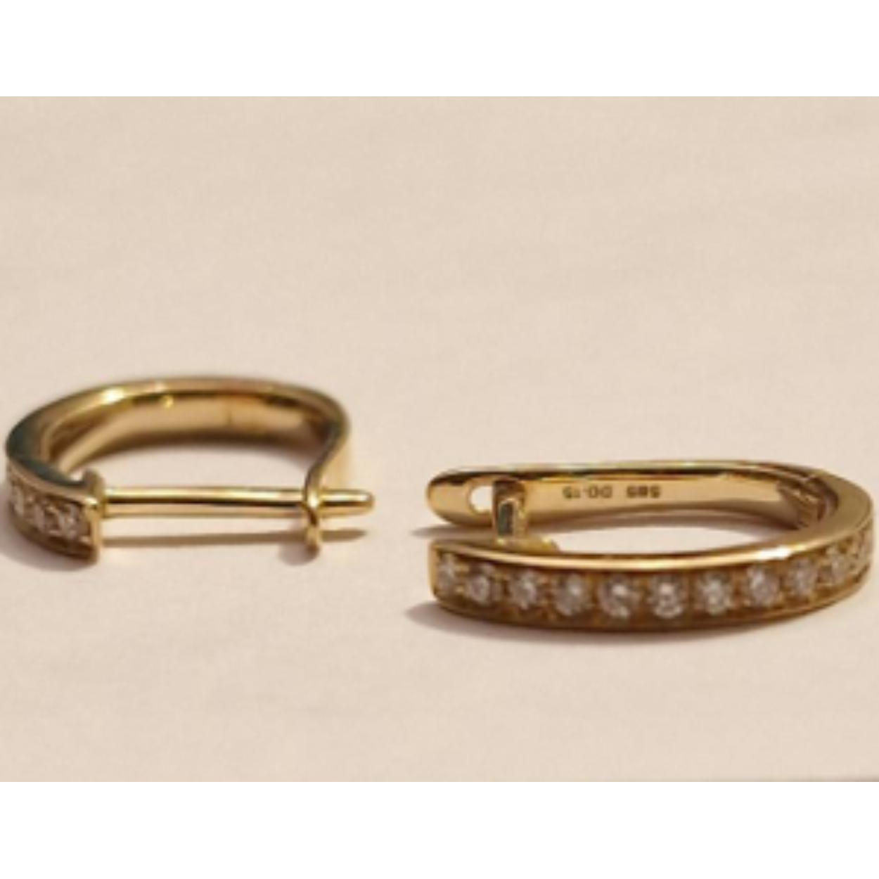 14k geelgoud ovale oorringen met diamant