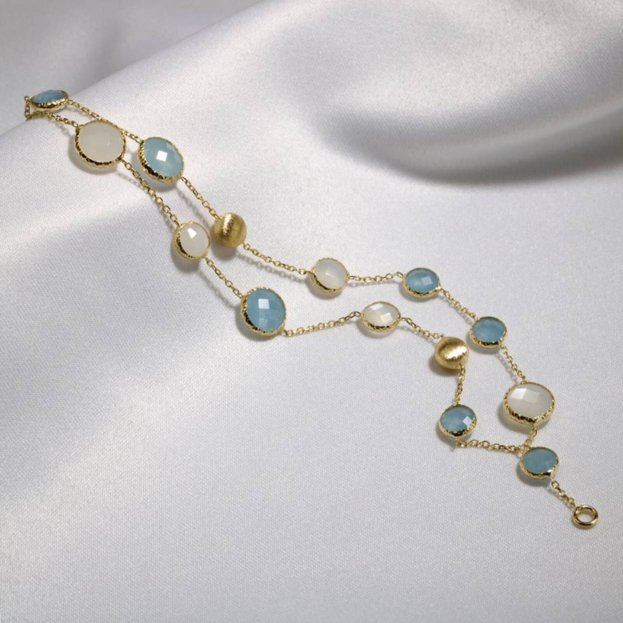 14 KRT GEELGOUDEN ARMBAND AQUAMARIJN EN MAANSTEEN MONZARIO