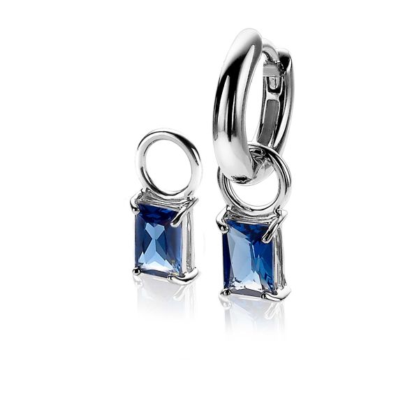 ZINZI zilveren oorbedels (12mm) met modieuze baguette geslepen rechthoekige donkerblauwe zirconia's. Hang deze oorbedels sierlijk aan je zilveren Zinzi oorringen. De oorbedels zijn 12mm lang. De oorringen zijn niet bij de prijs inbegrepen. Vervaardigd van eerste gehalte zilver (925) en met extra rodiumlaag voor een langdurige glans.