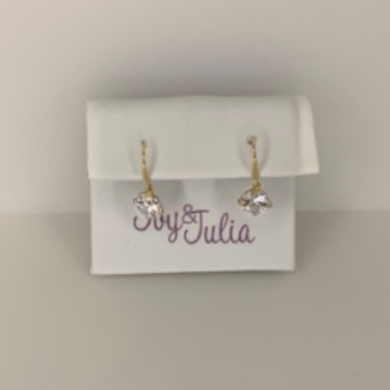 Gouden JJ oorhangers, hangende zirconias