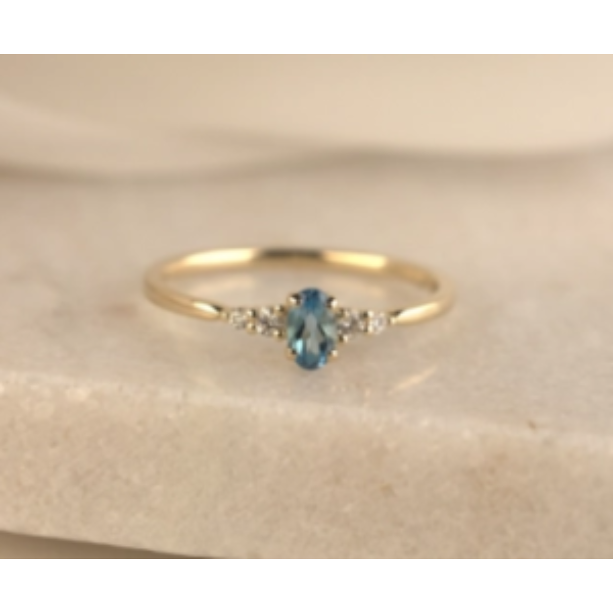 gg bril Lovo 0.07ct H/S1+ swiss blue toppas 17.5