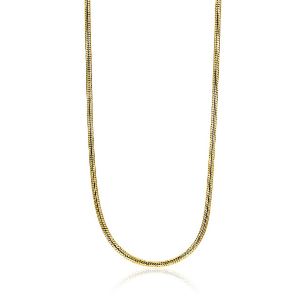 De Zinzi zlv. slangencollier, modelnummer ZISL42G, is een prachtig geelgoud verguld sieraad van 42 cm lang. Met een modern en elegant ontwerp is het perfect voor elke gelegenheid. Dit nikkelvrije collier valt onder de categorie sieraden en type ketting. Draag het subtiel solo of combineer het met andere kettingen voor een gelaagde look.