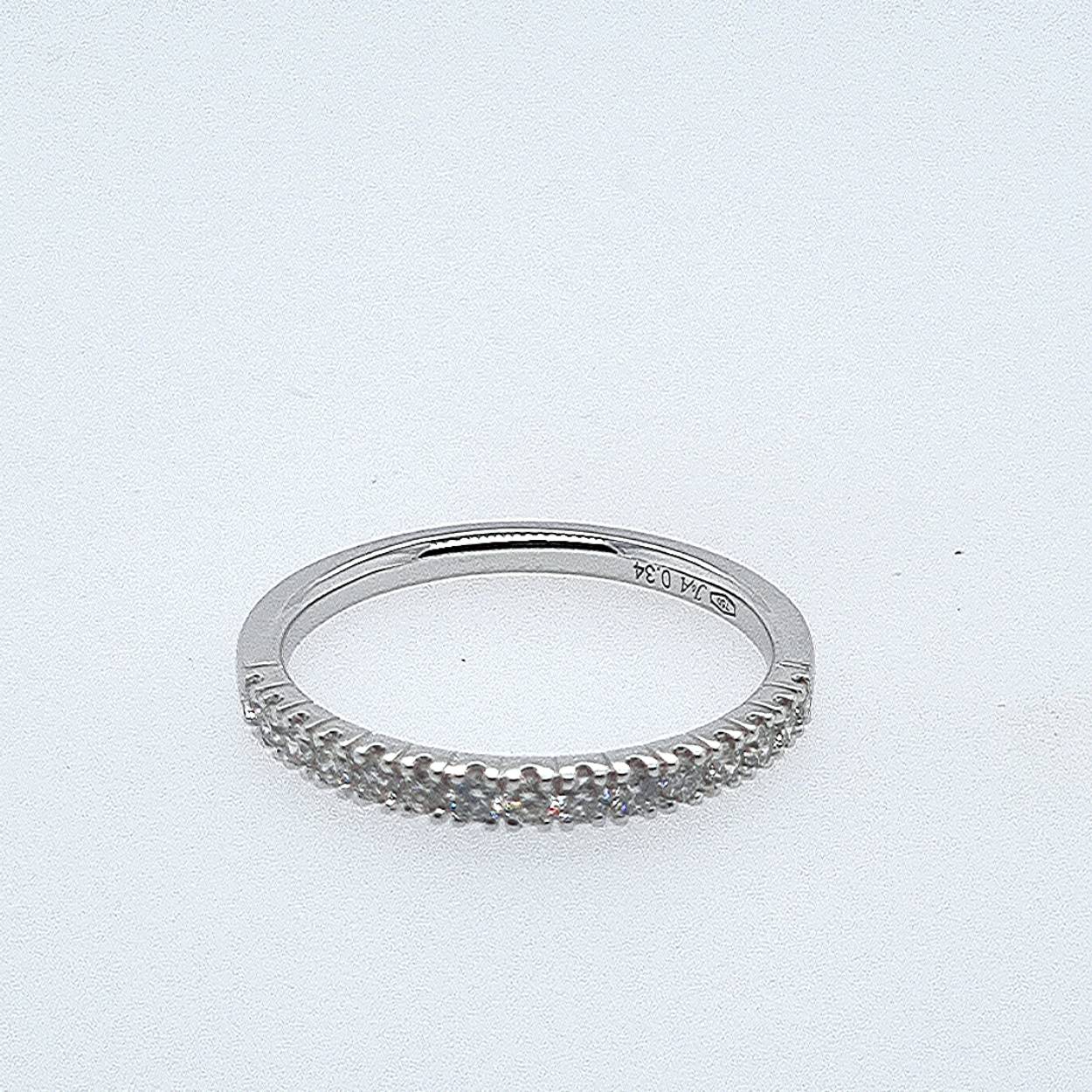 Trouwring wit goud 18kt met diamanten.