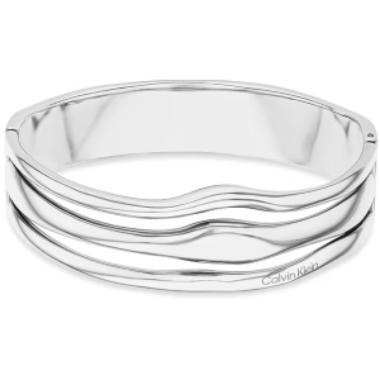Calvin Klein CJ35000718 Dames Bangle Staal
Deze stalen dames bangle van Calvin Klein met nr CJ35000718 heeft een sierlijk uiterlijk. De zilverkleurige bangle armband heeft bovenop 3 aparte sculpturele banden met ronde vormem.  Een fantasierijk geheel. Geschikt voor een pols van 17,5cm. Leuk te combineren met andere sieraden uit de serie van Calvin Klein.

OVER CALVIN KLEIN
Calvin Klein is een wereldwijd lifestylemerk dat gewaagde, vooruitstrevende idealen en een verleidelijke, vaak minimalistische, esthetiek nastreeft. Calvin Klein werd groot in de jaren 70 door haar mode- en merkjeans collecties. In de jaren 80 lanceerde Calvin Klein haar spraakmakende ondergoed dat uitdrukkelijk van logo ’s voorzien was. Vanwege het grote succes is het merk ook succesvol uitgerold in Accessoires, Parfums, Home, Brillen, Golf, Horloges en Sieraden.
Sinds de oprichting in 1968 door Calvin Klein, heeft het merk haar reputatie opgebouwd als leider in de Amerikaanse mode, dankzij een cleane esthetiek en innovatieve ontwerpen. Calvin Klein wil haar publiek verleiden en inspireren door middel van provocerende beelden en opvallende ontwerpen die prikkelen. 

SPECIFICATIES:
- Stalen dames bangle
- 17,5cm
- Zilverkleurig
- Glimmend