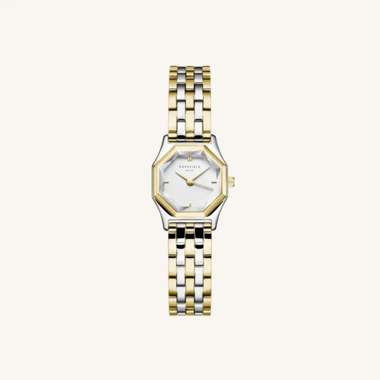 De Rosefield Gemme Duotone GWSSS-G03 is een stijlvolle analoge quartz polshorloge met een roestvrijstalen kast en band in goud-zilver kleuren. Voorzien van datumaanduiding, waterbestendig tot niveau 3 en antiallergisch. Perfect voor dagelijks gebruik of formele gelegenheden, en het past moeiteloos bij zowel casual als chique outfits. Een tijdloze aanvulling op elke garderobe.