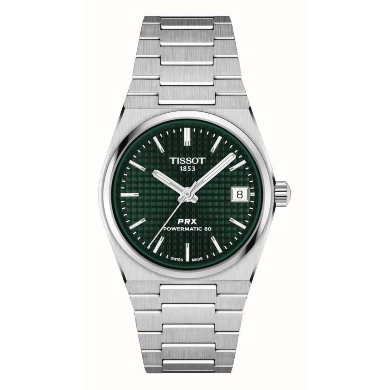Experience the Tissot PRX 35mm Powermatic 80, a harmonious fusion of vintage charm and contemporary functionality. This 35mm watch showcases a high-quality steel case and a striking green dial, paying tribute to its classic 1978 heritage. The unique waffle dial pattern brings depth and character to the automatic model. With water resistance up to 100 meters and a Nivachron™ balance hairspring, the PRX offers reliability and style for the modern watch enthusiast. The satin-finish steel bracelet with a triple-blade folding steel clasp ensures lasting comfort. Elevate your style with the Tissot PRX 35mm Powermatic 80 in green.