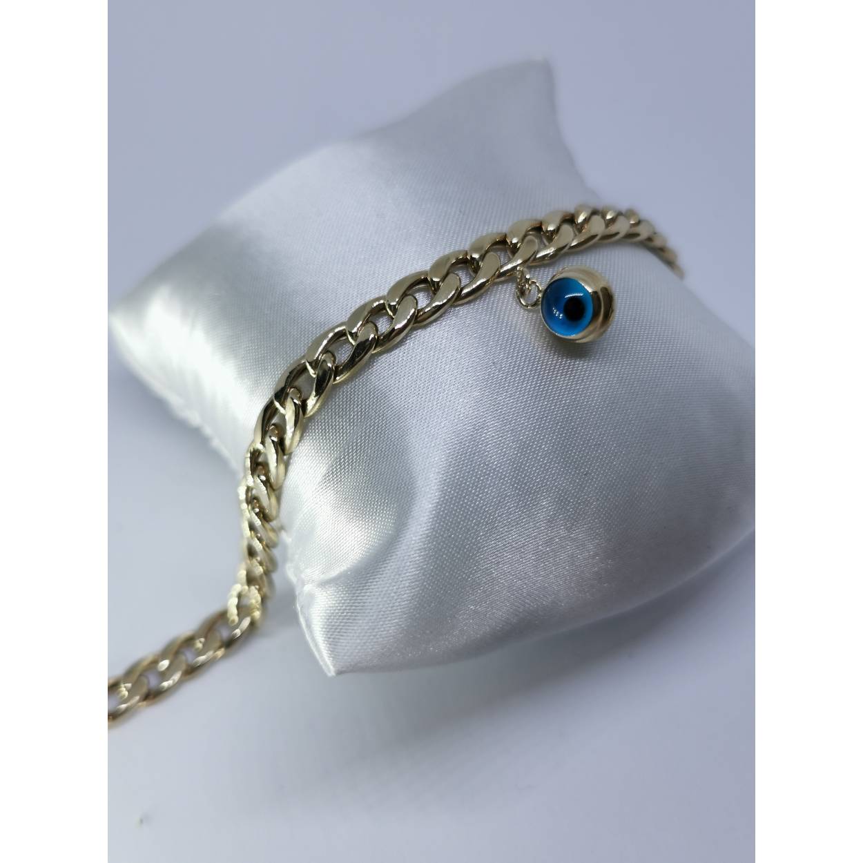 14 karaat geel gouden Cuban/gourmet schakel armband met blauwe nazar bedel. Breedte van de schakel: 6MM