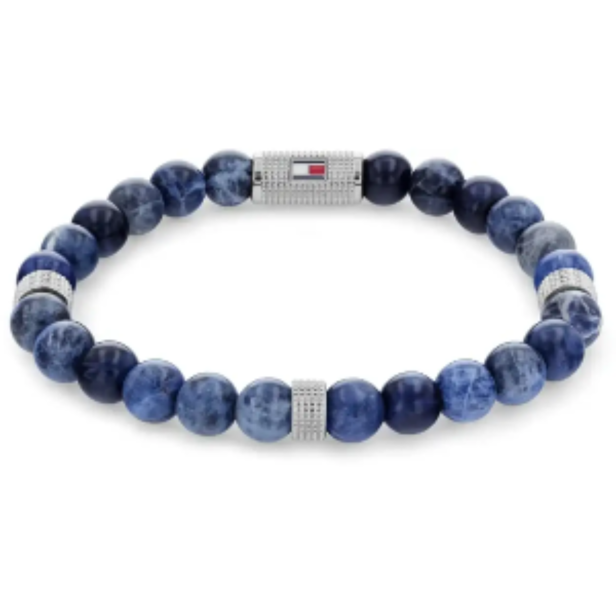 Tommy Hilfiger Jewels TJ2790436 Armband Heren Sodaliet Beads 18,5cm
Deze unieke armband van Tommy Hilfiger van de jewelry serie met nr: TJ2790436 is een stoer chique model. De blauwe sodaliet kralen heren armband is op elastiek geregen en heeft 3 fijne bewerkte tussenstukken en 1 wat groter tussenstuk met daarop het Tommy logo. De binnenste lengtemaat is 18,5cm maar door het elastiek is de armband makkelijk te dragen op verschillende pols breedte.

Het merk:
Tommy Hilfiger is wereldwijd één van de grootste designer lifestyle merken en is internationaal bekend om haar classic American cool stijl. De sieraden zijn voor dames en heren met een eigen stijl, die niet bang zijn om dit aan de wereld te laten zien.

Specificaties:
- Artikelnr: TJ2790436
- Blauwe beads armband
- Materiaal: Edelsteen
- Lengte rekbaar
- Heren sieraad