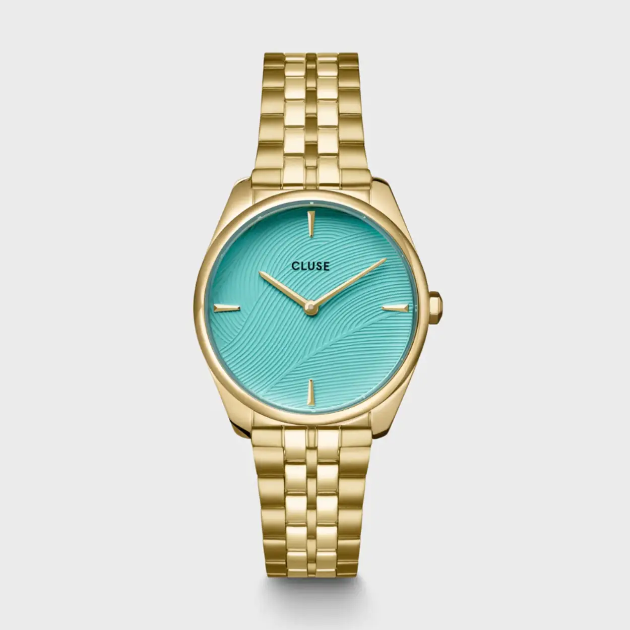 Dit charmante, eigentijdse item is een elegante aanvulling op jouw stijl, die geschikt is voor zowel het dagelijks leven als speciale gelegenheden. Met een goudkleurige ronde horlogekast van 31,5 mm, een goudkleurig roestvrijstalen horlogebandje met 5 schakels en een wijzerplaat met bladmotief in een zwembadblauwe kleur. Dit horloge is een eerbetoon aan de band tussen natuur en design. Pas makkelijk de look van je horloge aan met elk horlogebandje van 16 mm. De maat van het horlogebandje pas je gemakkelijk zelf aan!