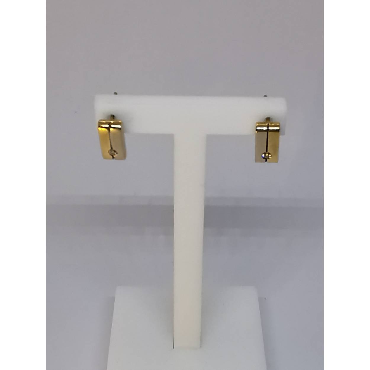 14 Karaat bi-color gouden fantasie oorstekers met briljant geslepen diamant.

Soort: Diamant
Slijpvorm: briljant
Karaat totaal: 0.04
Helderheid: VVS1
Kleur: G
Aantal: 1