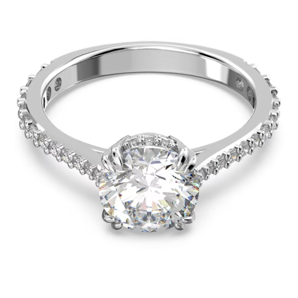 Deze Constella-ring bewijst dat eenvoud krachtig kan zijn en mag niet in uw collectie ontbreken. De vakkundig vervaardigde steen met princess-slijpvorm in het midden is voorzien van elegant pavé op de rijen en langs de band met rodium toplaag. Draag afzonderlijk en laat uw look stralen.