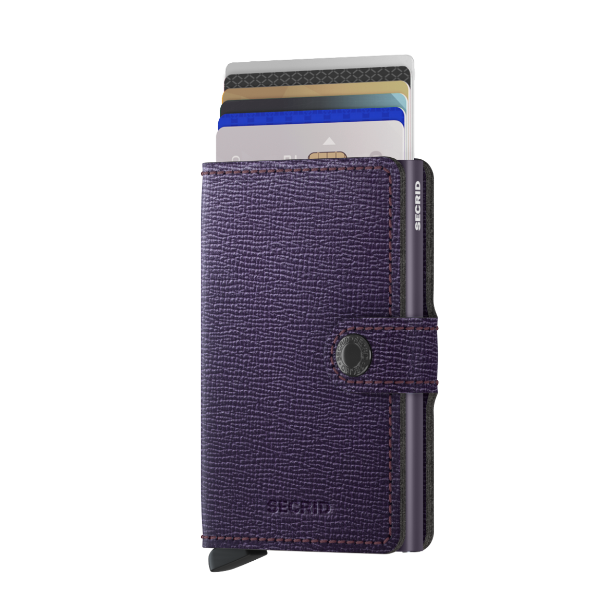 Met de Secrid cardprotector als basis, is de Miniwallet een compacte én veilige portemonnee. De portemonnee sluit af door middel van een drukknoopsluiting. De aluminium cardprotector in de Miniwallet beschermt uw belangrijkste passen optimaal, zowel tegen buigen, slijten en breken als tegen ongewenst uitlezen van RFID-kaarten (zoals de OV-chipkaart, ID-kaart, de nieuwste creditcards en bedrijfspasjes). De Secrid Miniwallet is geschikt voor 6 vlakke kaarten of 4 kaarten met verdikte letters. Naast zes kaarten in de cardprotector biedt het binnenwerk ruimte voor enkele kaarten, papiergeld, bonnetjes en visitekaartjes. De Secrid Miniwallet is een compacte portemonnee en vanwege de druksluiting gemakkelijk mee te nemen. Dankzij het unieke ontwerp schuiven de kaarten trapsgewijs naar buiten voor een eenvoudige selectie. De Secrid Miniwallet wordt geleverd in een mooie verpakking en daardoor ook zeer geschikt als uniek cadeau. Crisple variant: gecorrigeerd leer en hierdoor gemakkelijk te onderhouden. - Vervaardigd uit echt Europees leer - Sluit af met een drukknoopsluiting - Protector gemaakt van massief aluminium - Formaat slechts 21 mm dik - Ruimte voor 6 vlakke kaarten of 4 kaarten met verdikte letters (bepaalde creditcards) - Extra ruimte voor briefgeld, visitekaartjes, garantiebonnen of 4 extra passen - Geschikt voor enkele munten - Beschermt kaarten tegen buigen, slijten, breken en ongewenst uitlezen (skimmen) - Met één druk op de knop schuiven de kaarten trapsgewijs naar buiten 2 jaar garantie