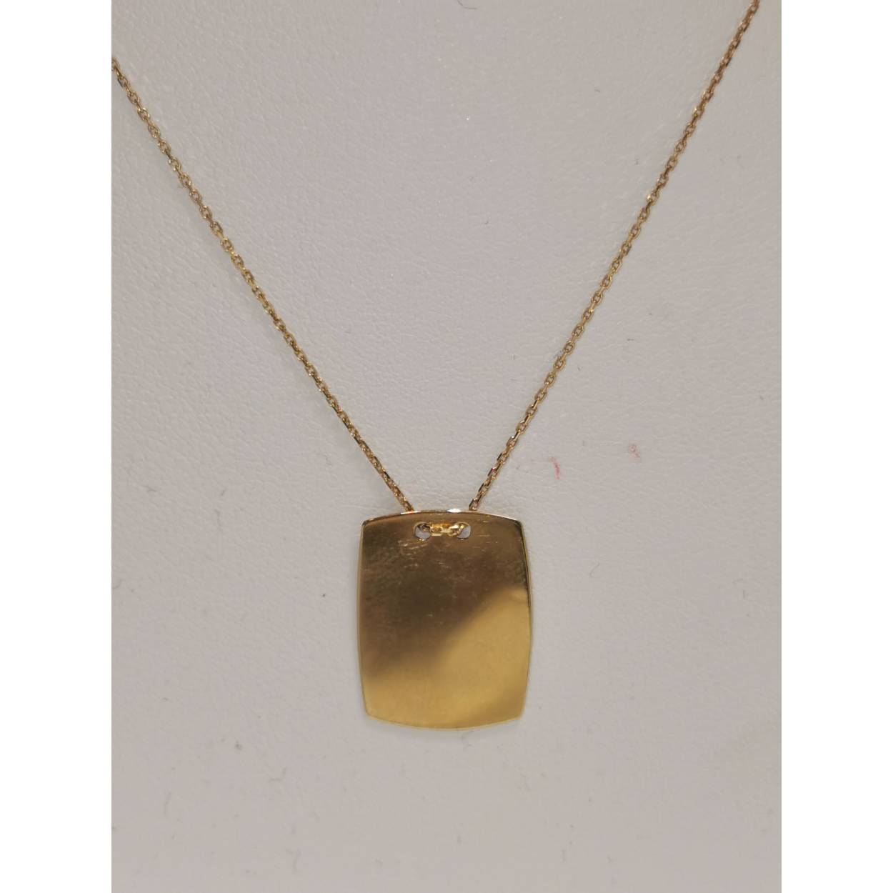 14 Karaat geel gouden fijne schakel collier met rechthoekig plaatje.

Lengte van collier: 42 cm