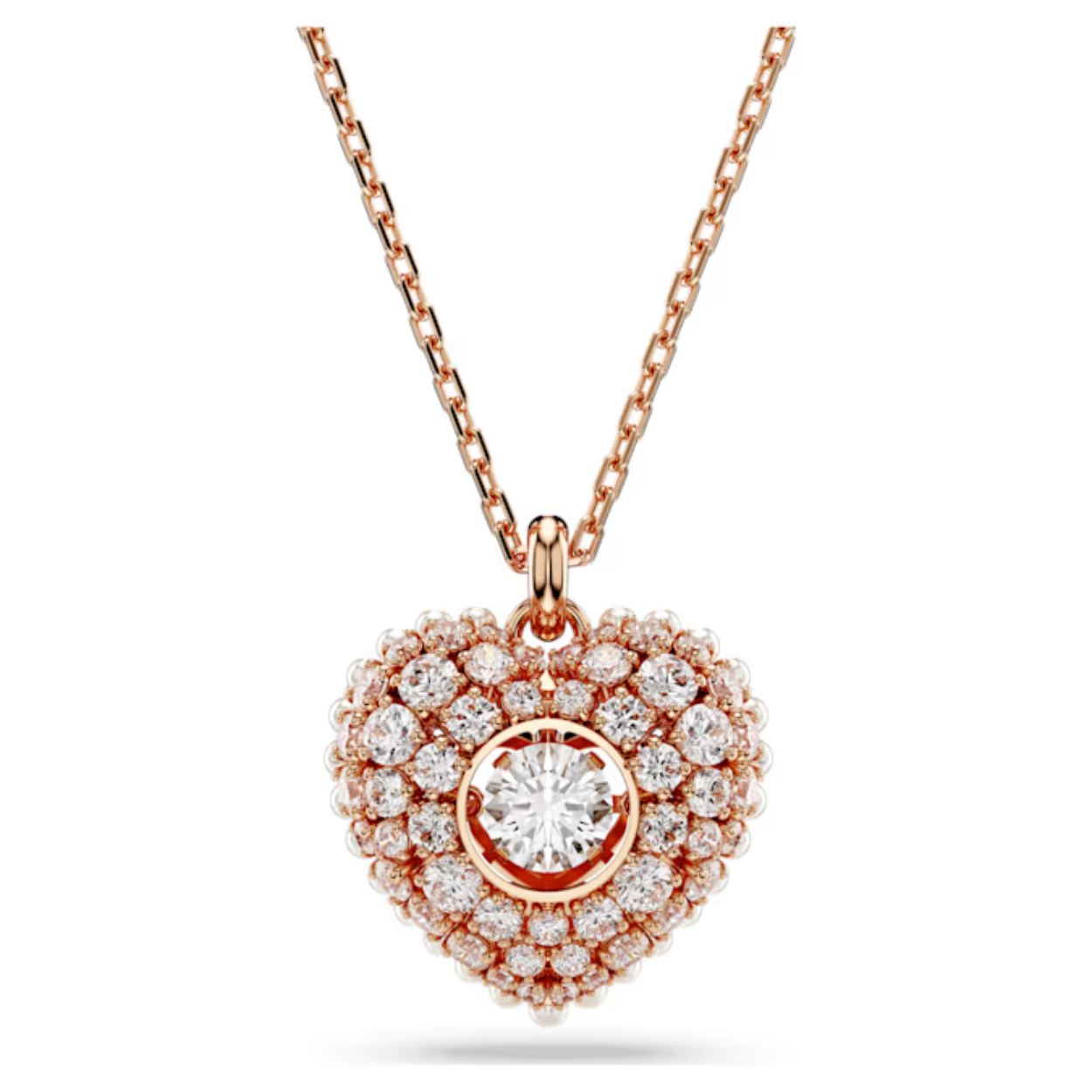 Deze schattige harthanger is het toonbeeld van Swarovski’s exquise savoir-faire. Het motief met roségoudkleurige toplaag heeft een kooiontwerp voor maximaal volume en is bezaaid met kleine witte Crystal Pearls langs de rand. Om het koepelvormige effect te benadrukken, is het hart gedecoreerd met heldere Swarovski Zirkonia gezet met de oogverblindende chatontechniek en in het midden vangt een ronde bewegende Swarovski Zirkonia het licht vanuit elke hoek. Een romantische manier om uw stijl extra warmte en licht te geven.