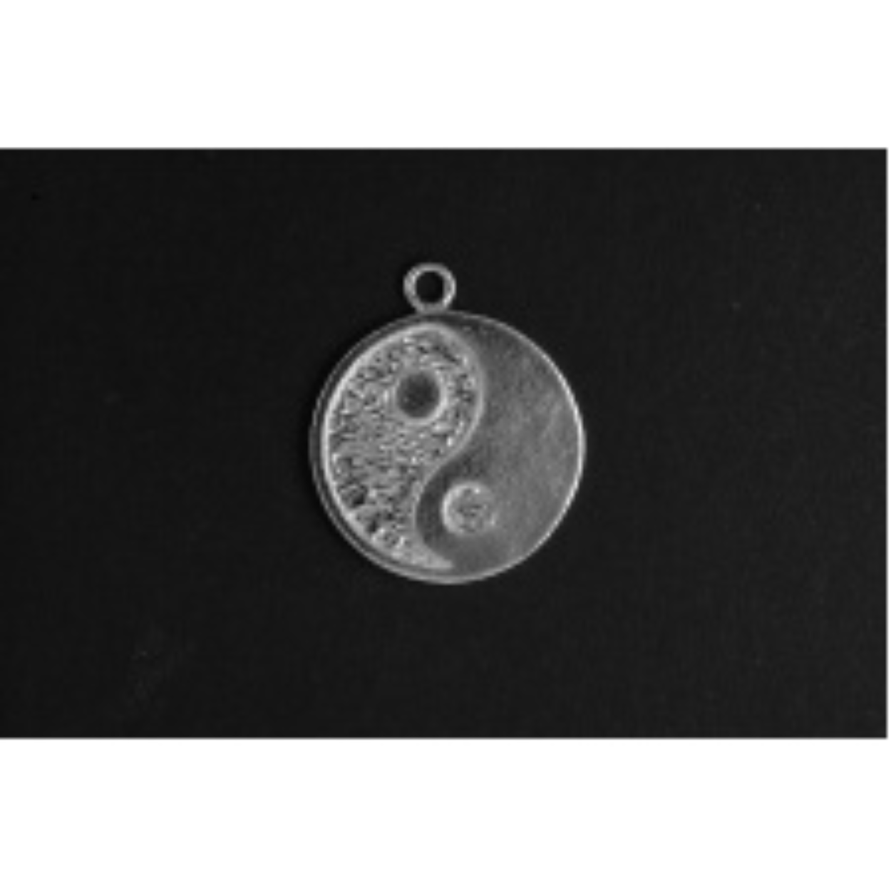 Yin Yan middel zilver
De bedel maat is in mm Lengte x Hoogte
± L 20.25 x H 23.84