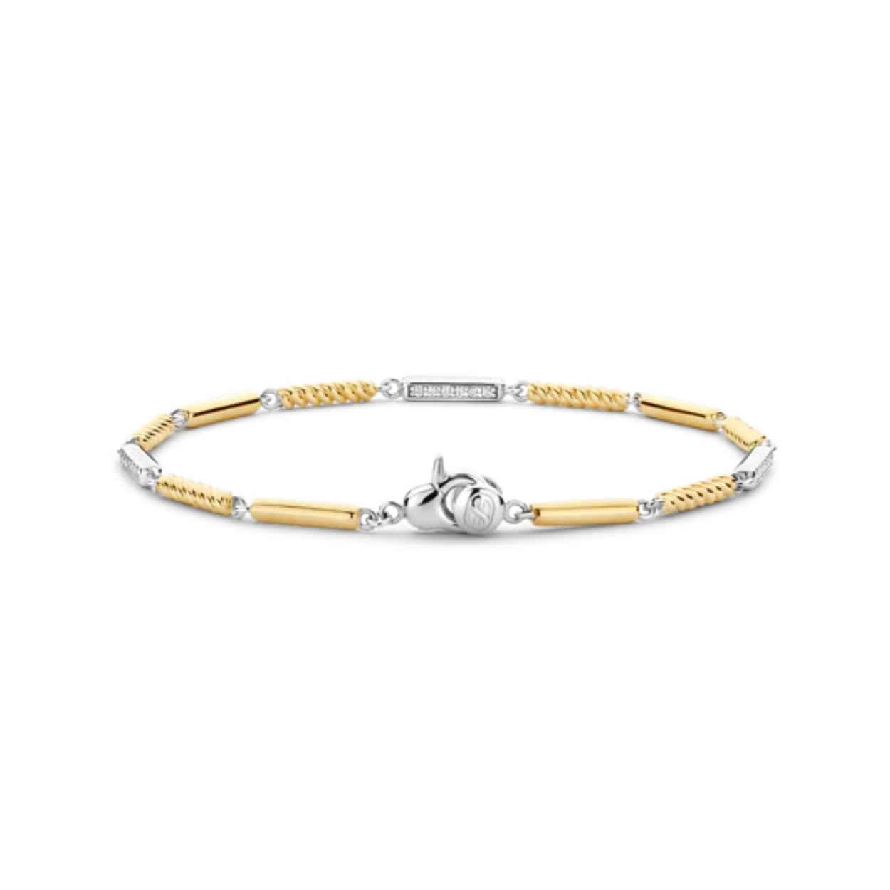 De TI SENTO armband 23069ZY verrijkt je elegantie met een stralende combinatie van luxe materialen en tijdloos design. Deze armband heeft afwisselend sterling zilveren schakels en vergulde schakels, waarvan sommige zijn verfraaid met delicate pavé-set cubic zirconia accenten, terwijl andere een speelse touwstructuur tonen. De armband is vervaardigd uit premium 925 sterling zilver en verguld. Perfect in lijn met de gloed van warme zomerdagen, voegt dit stuk verfijning en sprankeling toe aan elk ensemble. Of je nu geniet van een zonnige middag of een glamoureuze avond, de uitstekende afwerking en het harmonieuze ontwerp maken het een veelzijdig accessoire. Hypoallergeen en nikkelvrij, zorgt deze armband voor langdurig comfort en biedt blijvende kwaliteit.
