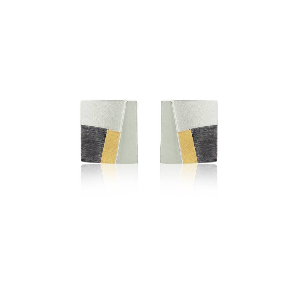 925 white silver earrings combined with oxidized silver and 18k yellow gold. Omega clasp