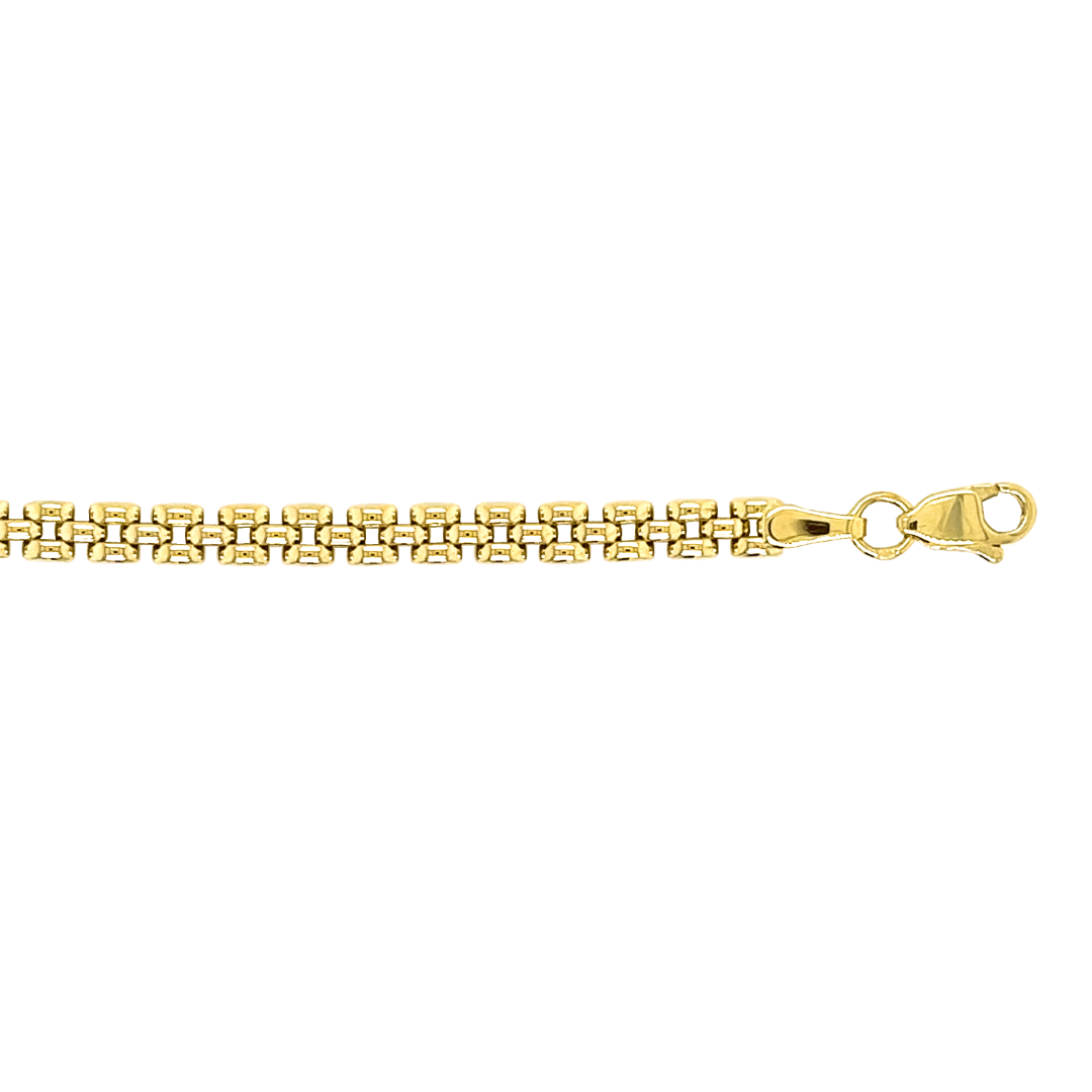 Deze 14-karaats geel gouden Rolex schakel armband is ontzettend elegant. De armband bestaat uit drie rijen met licht gebolde schakelstukken. De armband is fijn gepolijst en heeft hierdoor een mooie glans.