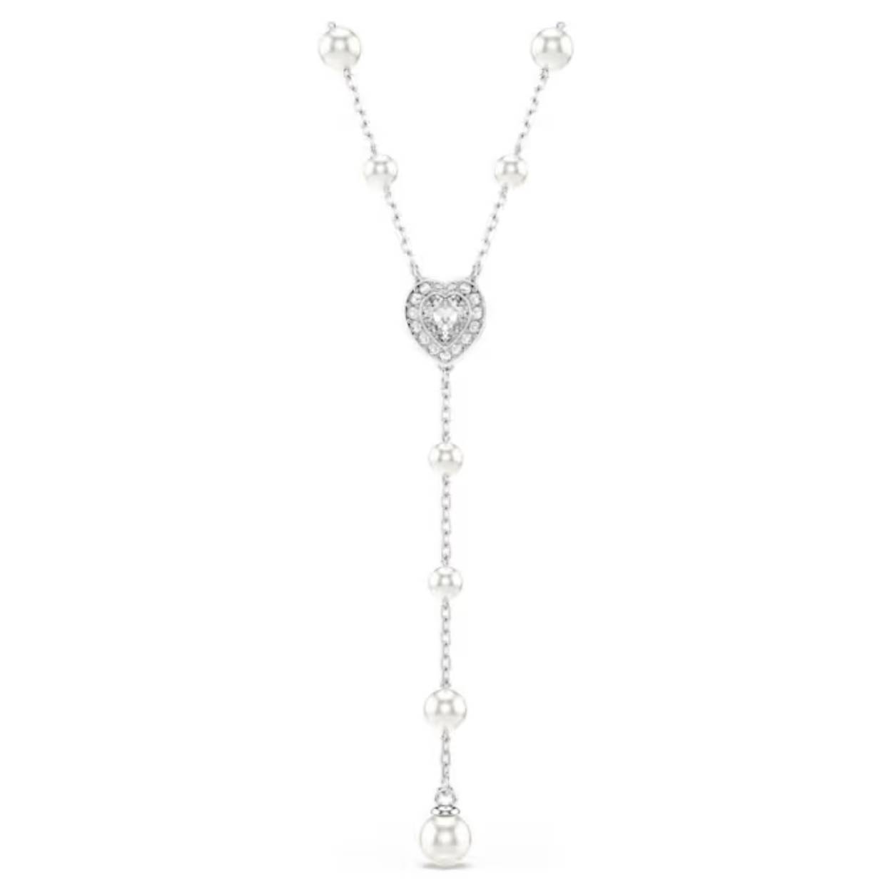 Deze T-vormige ketting is met finesse vervaardigd en straalt een soort tijdloze schoonheid uit – een symbool van Swarovski’s vreugdevolle extravagantie. Het ontwerp met een rodium toplaag heeft een verfijnde ketting geaccentueerd met Swarovski Crystal Pearls. Een hartvormig motief siert het midden en wordt omringd door glinsterende pavé. De hanger geeft de ketting een elegante finishing touch. Combineer deze ketting met andere bijpassende sieraden en creëer zo uw eigen stralende combinaties.
Artikelnr.: 5720855
Collectie:  Ariana Grande x Swarovski
Lengte (minimum - maximum): 38 - 48 cm
Formaat motief: 1 x 1 cm
Materiaal:  Kristallen, Rodium-verguld, Crystal pearl
Kleur:  Wit
Type sluiting:  Schuifbare bal