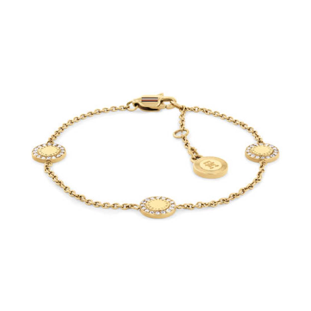 Tommy Hilfiger Jewels TJ2780905 Armband Dames Staal 19cm
Deze armband van Tommy Hilfiger uit de jewelry serie MINI CRISTALS met nr: TJ2780905 is een verfijnd model. De goudkleurige stalen dames armband heeft een ankerschakel met meerdere plaatjes over de lengte verdeeld. In de rand van het plaatje zitten hele fijne kristallen op rij. De armband heeft divere tussenoogjes waardoor hij op de lengte 16 tot 19cm te dragen is. Ook leuk te combineren met andere armbanden en sieraden van Tommy Hilfiger.

Het merk:
Tommy Hilfiger is wereldwijd één van de grootste designer lifestyle merken en is internationaal bekend om haar classic American cool stijl. De sieraden zijn voor dames en heren met een eigen stijl, die niet bang zijn om dit aan de wereld te laten zien.

Specificaties:
- Fijne schakelarmband goudkleurig
- Materiaal: Staal
- Totale lengte 19cm
- Dames sieraad