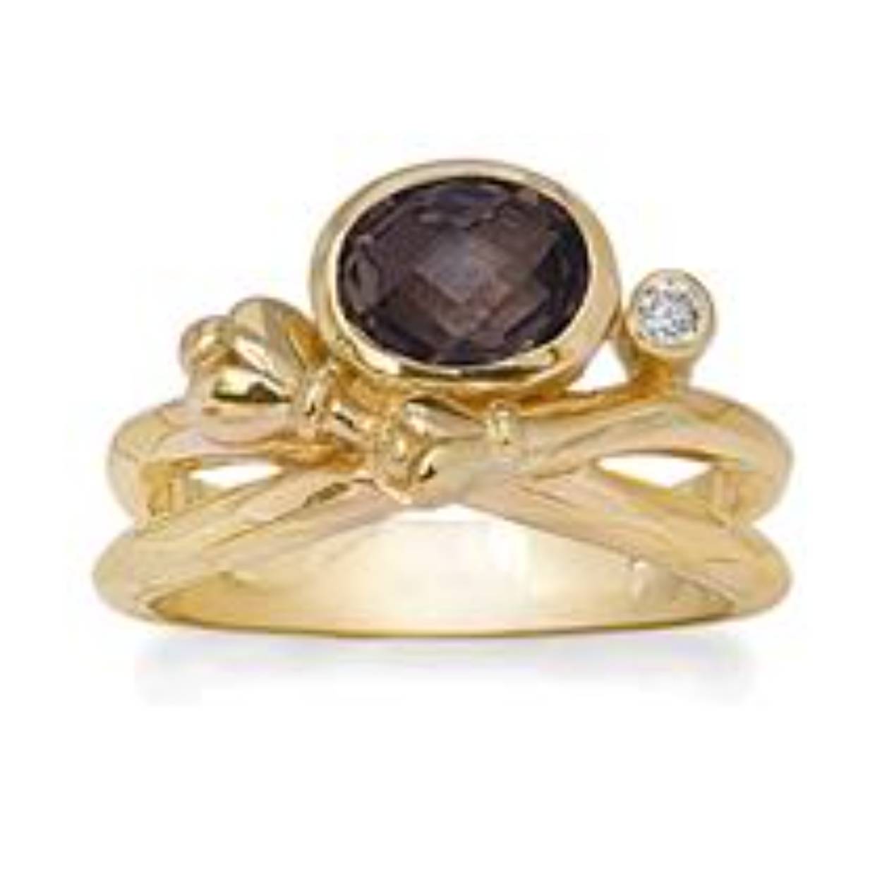 Deze geel goud vergulde ring bevat een rookkwarts steentje van 8 x 6 mm en een 2 mm zirkonia.