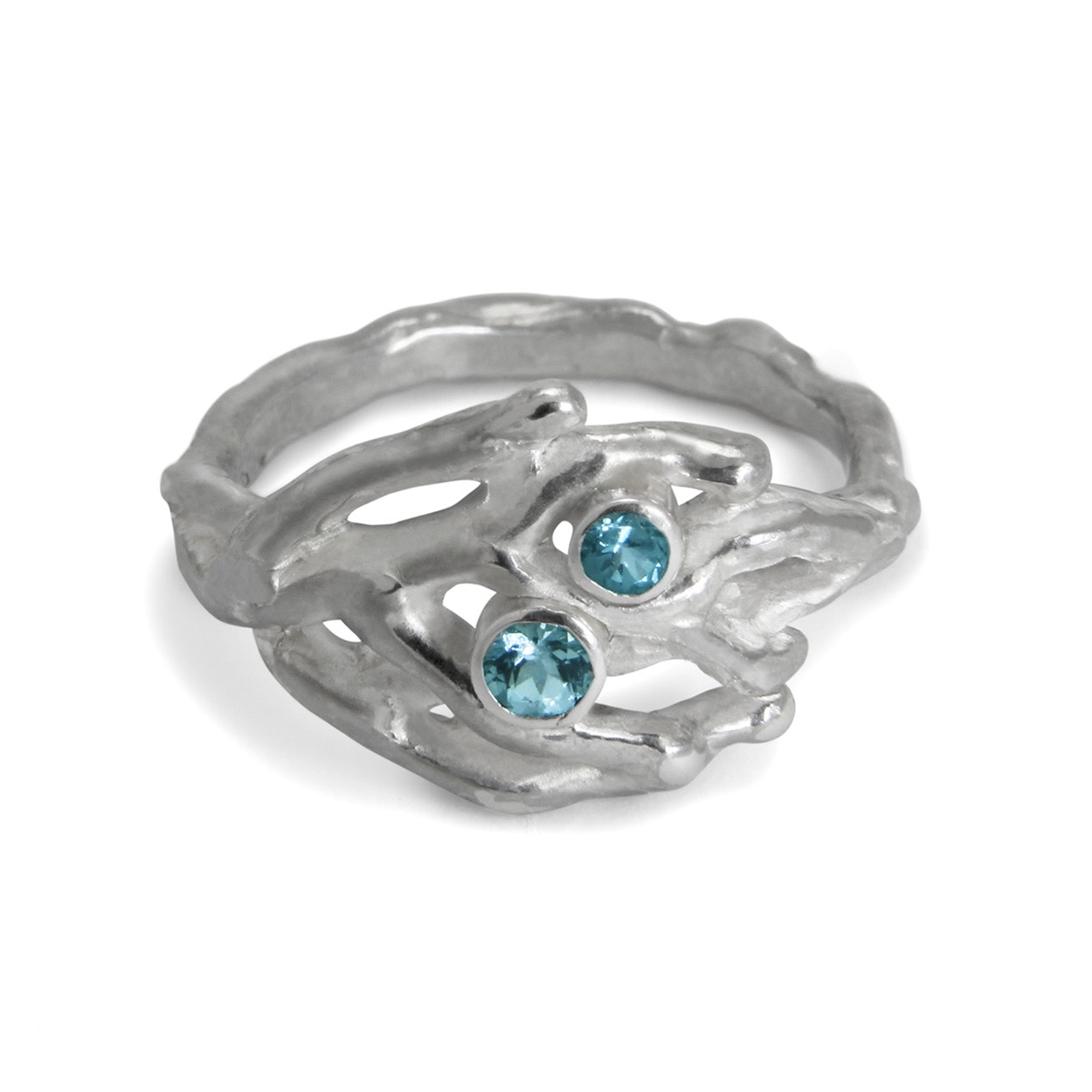 Zilveren ring met 2x topaas gemaakt in eigen atelier geïnspireerd op de mooie koralen uit de zee.
