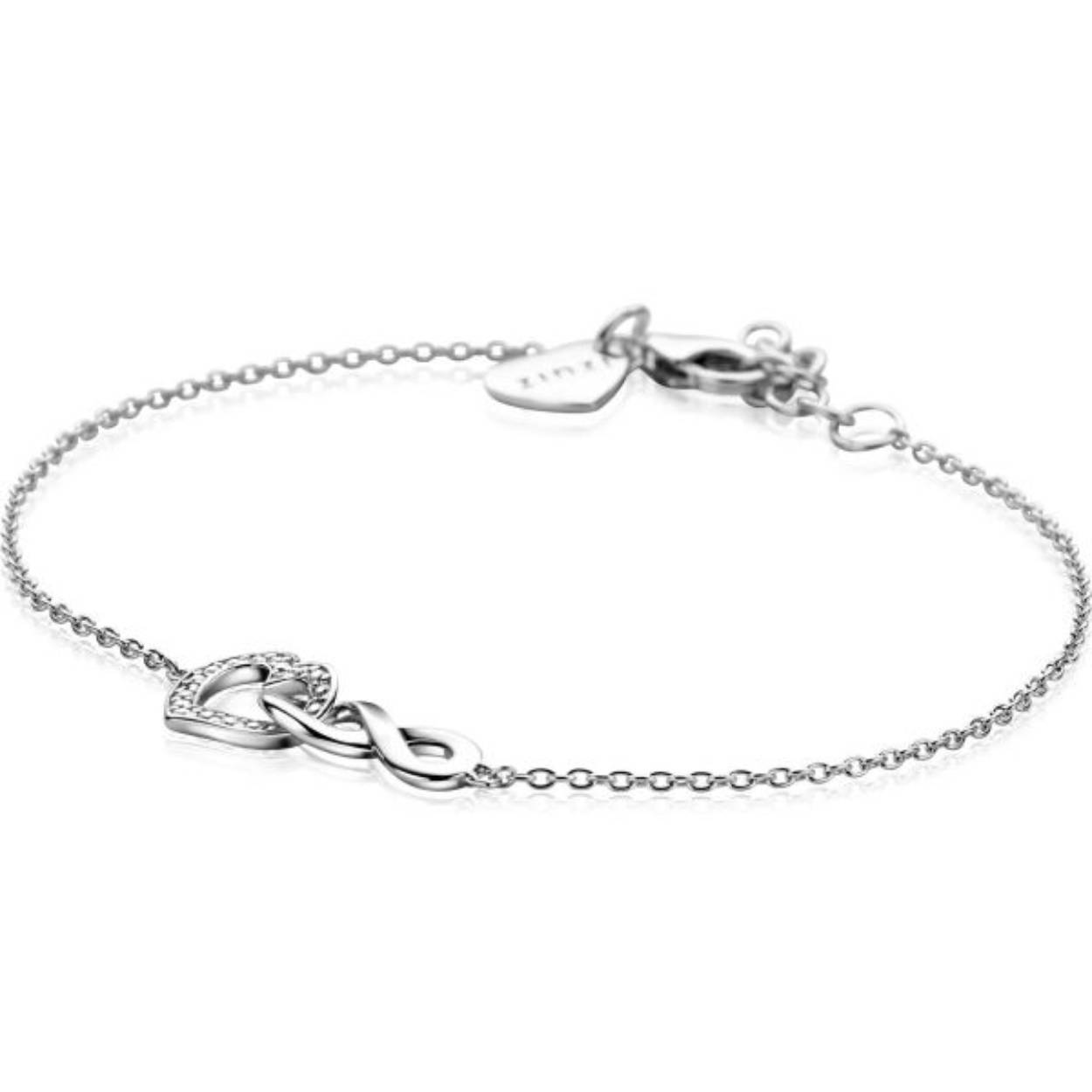 ZINZI zilveren armband met fijne jasseron schakels met in het midden een glad Infinity teken verbonden met een schitterend open hart, bezet met witte zirconia's. De lengte van de armband is te variëren tussen 17-19 cm. Vervaardigd van eerste gehalte zilver (925) en voorzien van een extra rodium laag voor een langdurige glans.